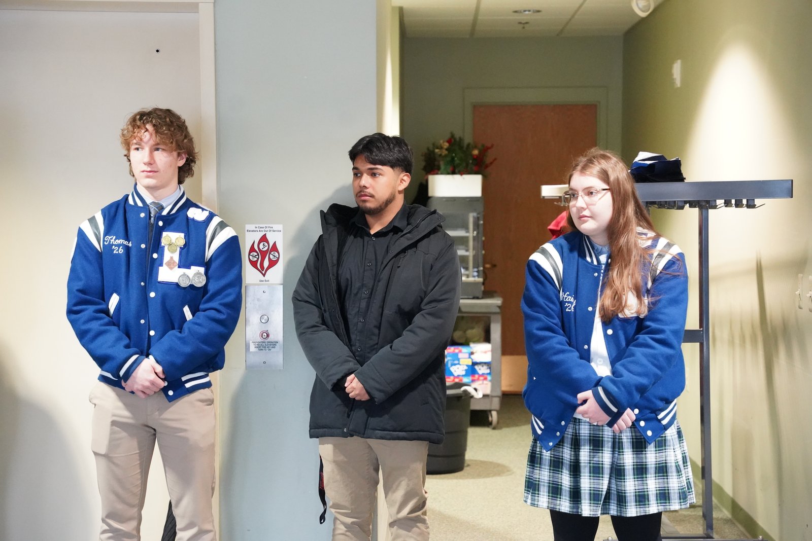 Our Lady of the Lakes seniors Thomas Herrington (left) and Haily Hutsell (right) organized this year's blood drives. Diesel Rodriguez, Class of '25 (center), organized last year's blood drives with Ashlee Leddy, Class of '25.