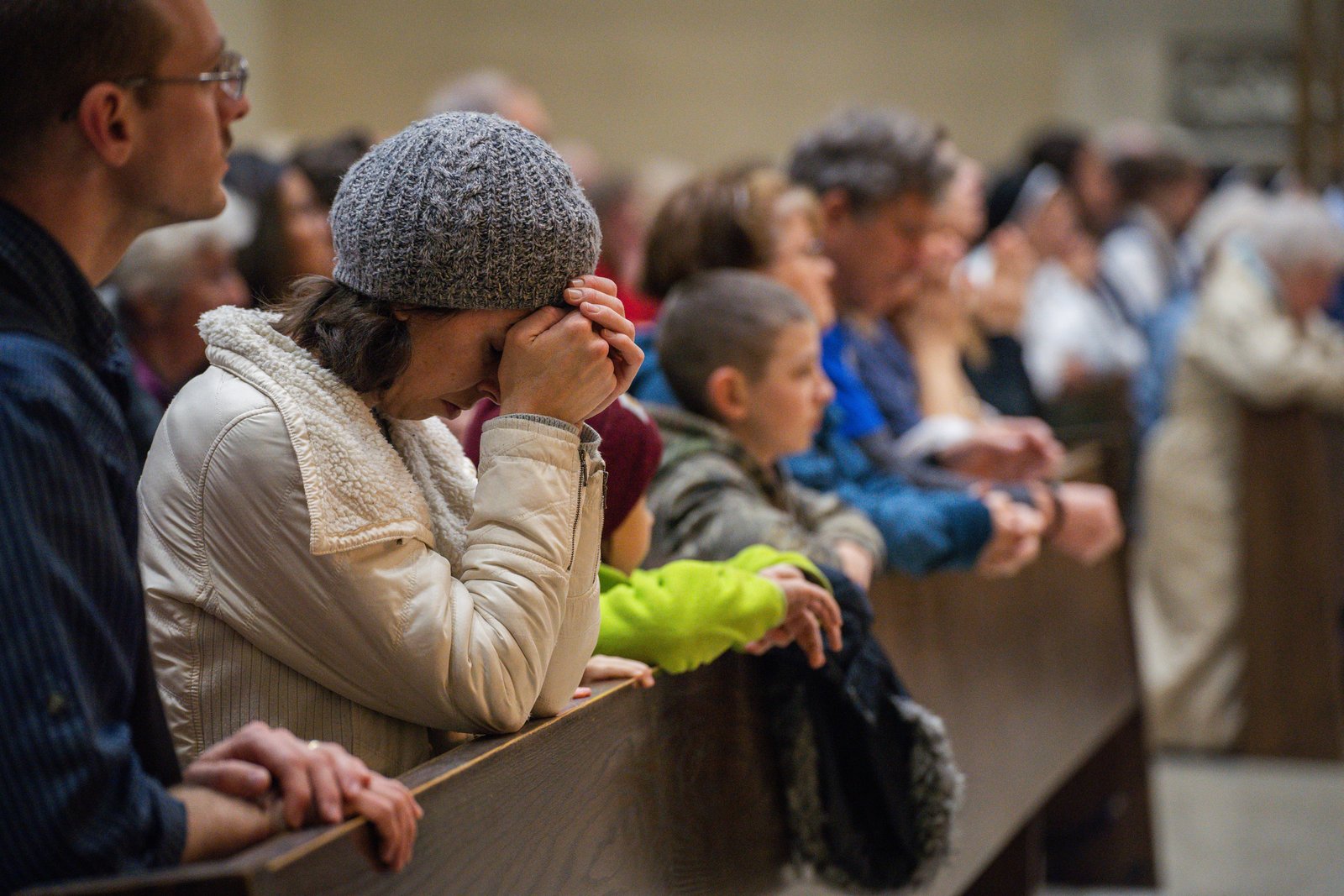 Catholics pray inside St. Mary's Cathedral in Lansing during a pre-march Mass for Life celebrated by several of Michigan's bishops, including Detroit Archbishop Allen H. Vigneron and Lansing Bishop Earl Boyea, who delivered the homily.