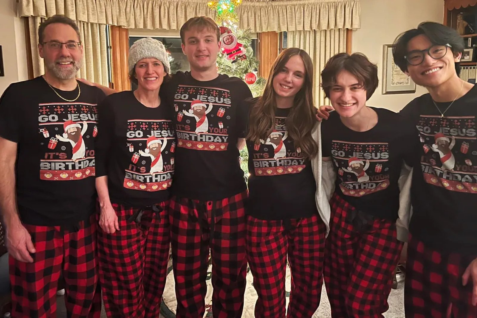Fazzini is pictured with his family, from left, wife Suzie, son Ben, Ben's girlfriend Elena, daughter Chloe, and her boyfriend Nathan.