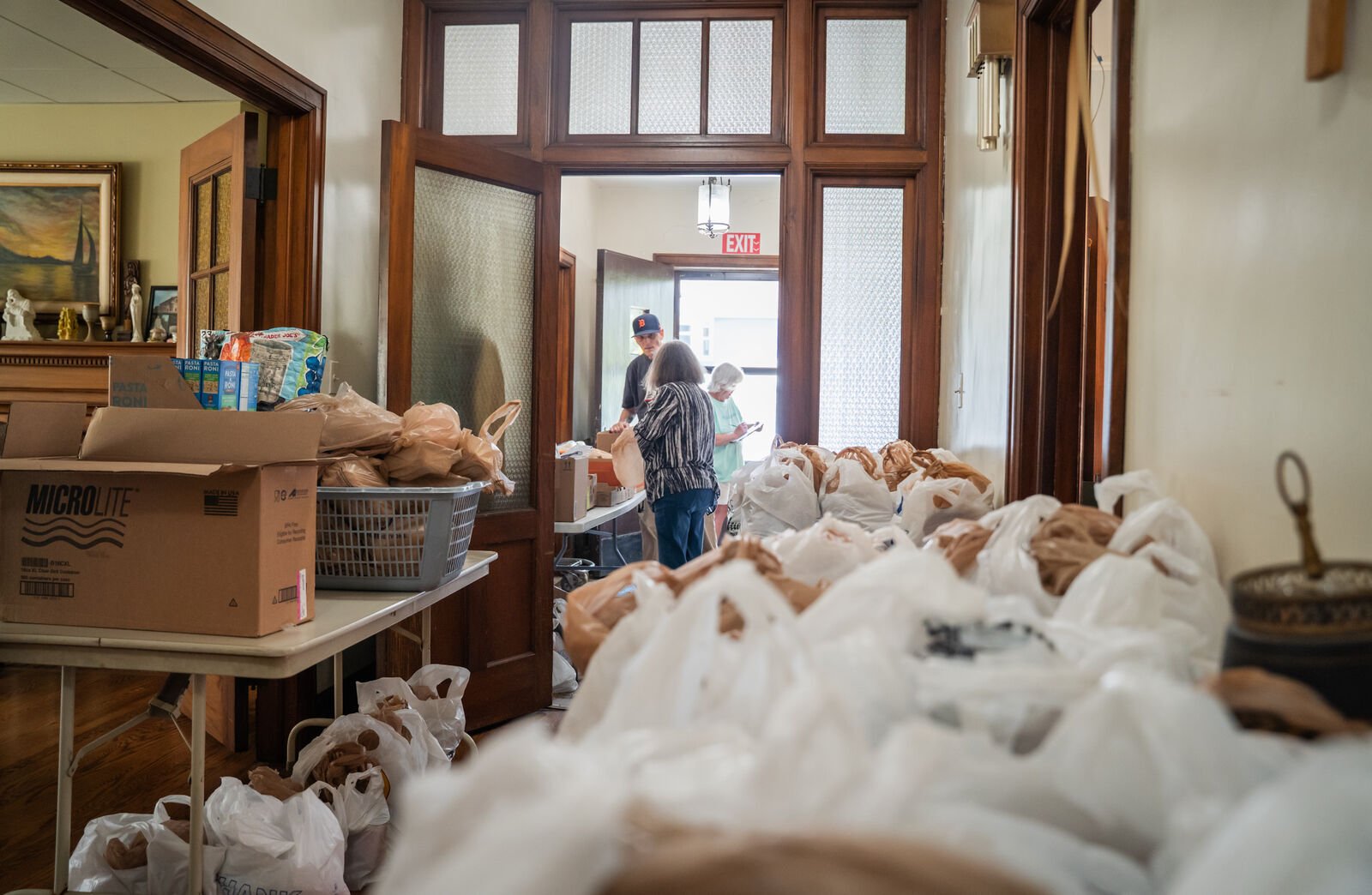 Food is ready for distribution at Nativity of Our Lord Parish in Detroit. Food pantries parishes, such as Nativity's, have been affected by higher food prices because of a reduction in USDA-backed food that pantries can purchase at food banks. (Photo by Valaurian Waller | Detroit Catholic)