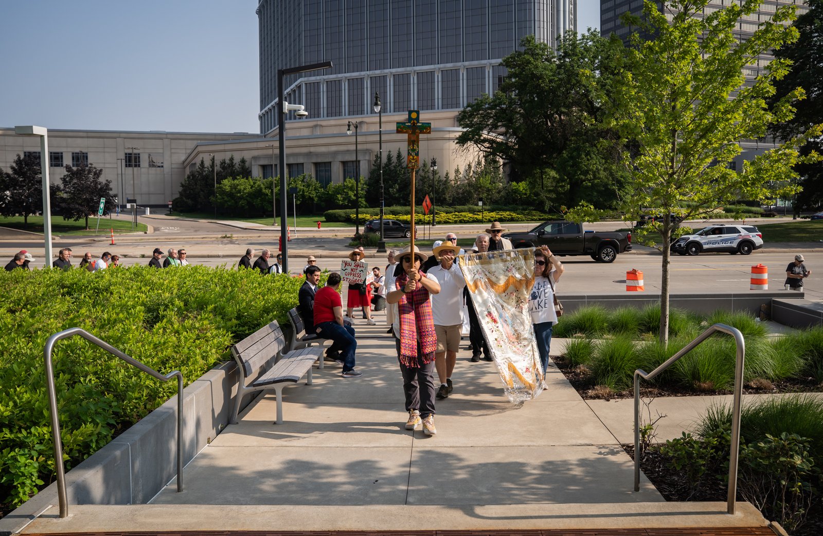 Catholic clergy and lay faithful, joined by others of various denominations, held a procession from Most Holy Trinity Parish in Corktown to the Immigration and Customs Enforcement regional field office July 14 to deliver a letter citing concerns about deportation actions.