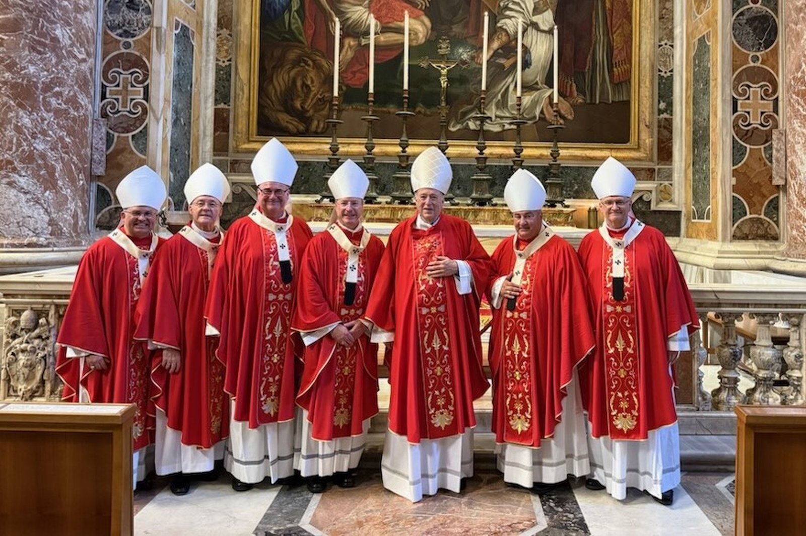 Seven of the eight U.S. archbishops who received their pallium from Pope Leo XIV, including Archbishop Edward J. Weisenburger, right, gather for a photograph shortly after the Mass on the Solemnity of SS. Peter and Paul, June 29, at St. Peter's Basilica at the Vatican. Pope Leo imposed the pallium upon the shoulders of the new archbishops as a symbol of their responsibility as shepherd's of Christ's flock and their fidelity to the Holy Father.