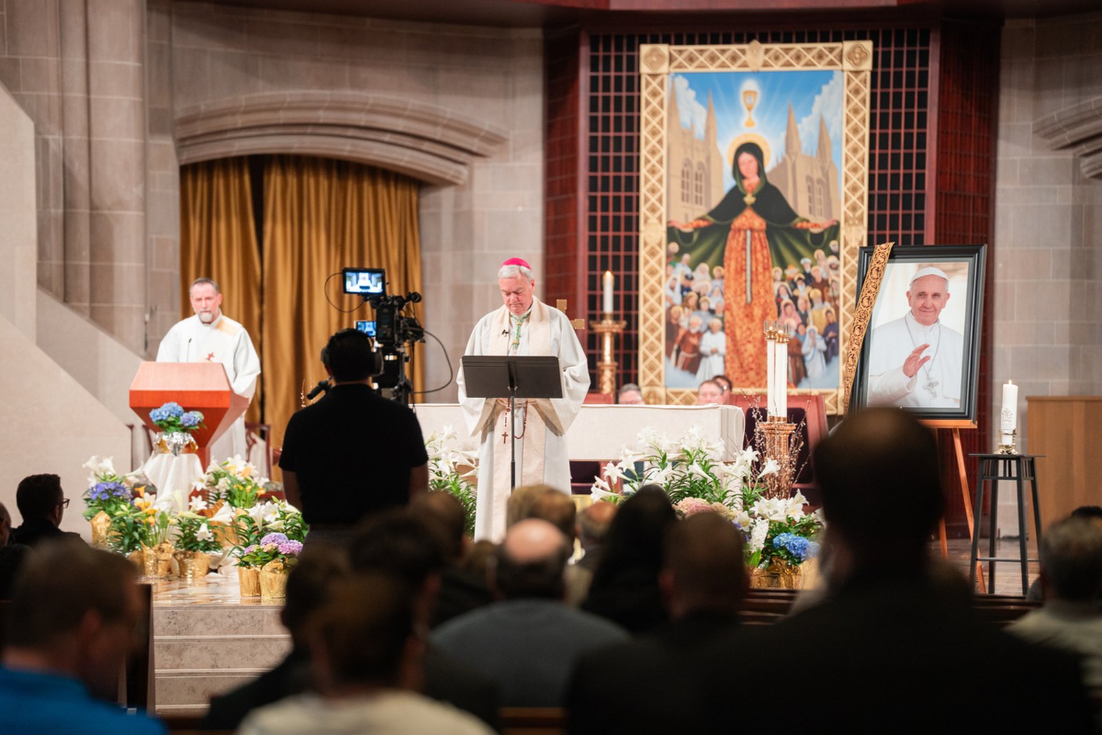 Detroit Auxiliary Bishop Robert J. Fisher leads a rosary before Mass on April 21 at the Cathedral of the Most Blessed Sacrament for the repose of Pope Francis' soul.