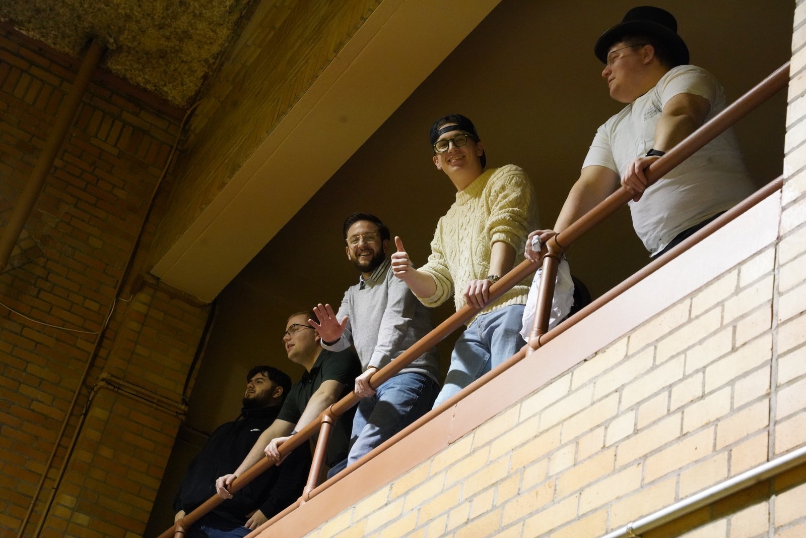 Sacred Heart Major Seminary seminarians provide some friendly heckling from the gymnasium balcony during the priest-seminarian basketball game.