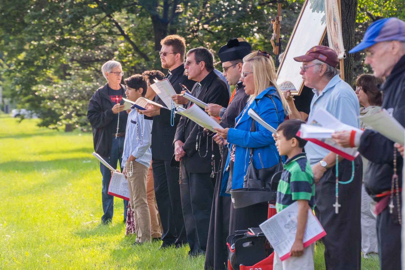 Archbishop Allen H. Vigneron leads a group of Catholics in prayer outside the Eastland Women's Clinic in Eastpointe in August 2021. (Valaurian Waller | Detroit Catholic)