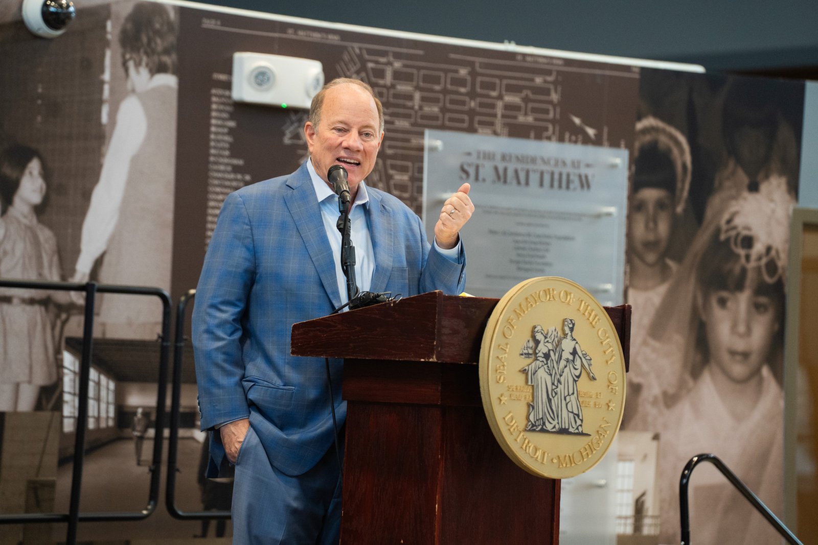 Detroit Mayor Mike Duggan, who was baptized at St. Matthew Parish as a child, speaks during the unveiling of the new Residences at St. Matthew.
