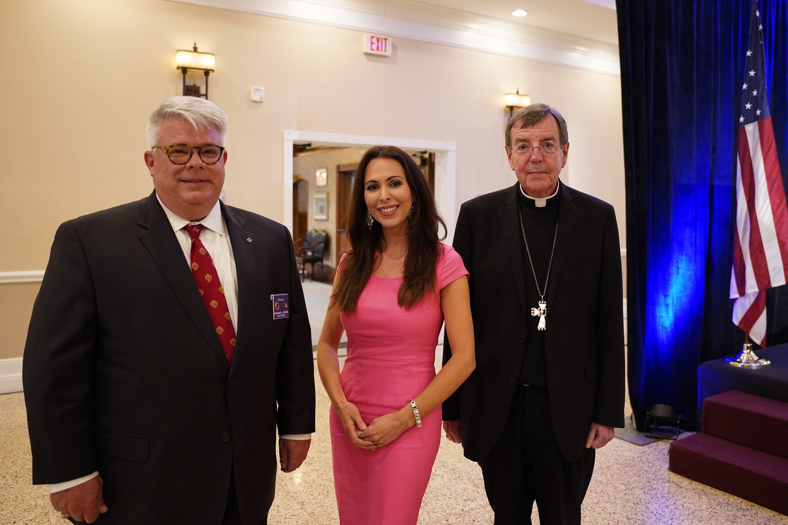 Christopher Kolomjec, state deputy for the Michigan Knights of Columbus, left, is pictured with actress and TV host Joelle Maryn, center, the evening's keynote speaker, and Detroit Archbishop Allen H. Vigneron, who delivered the evening's prayer.