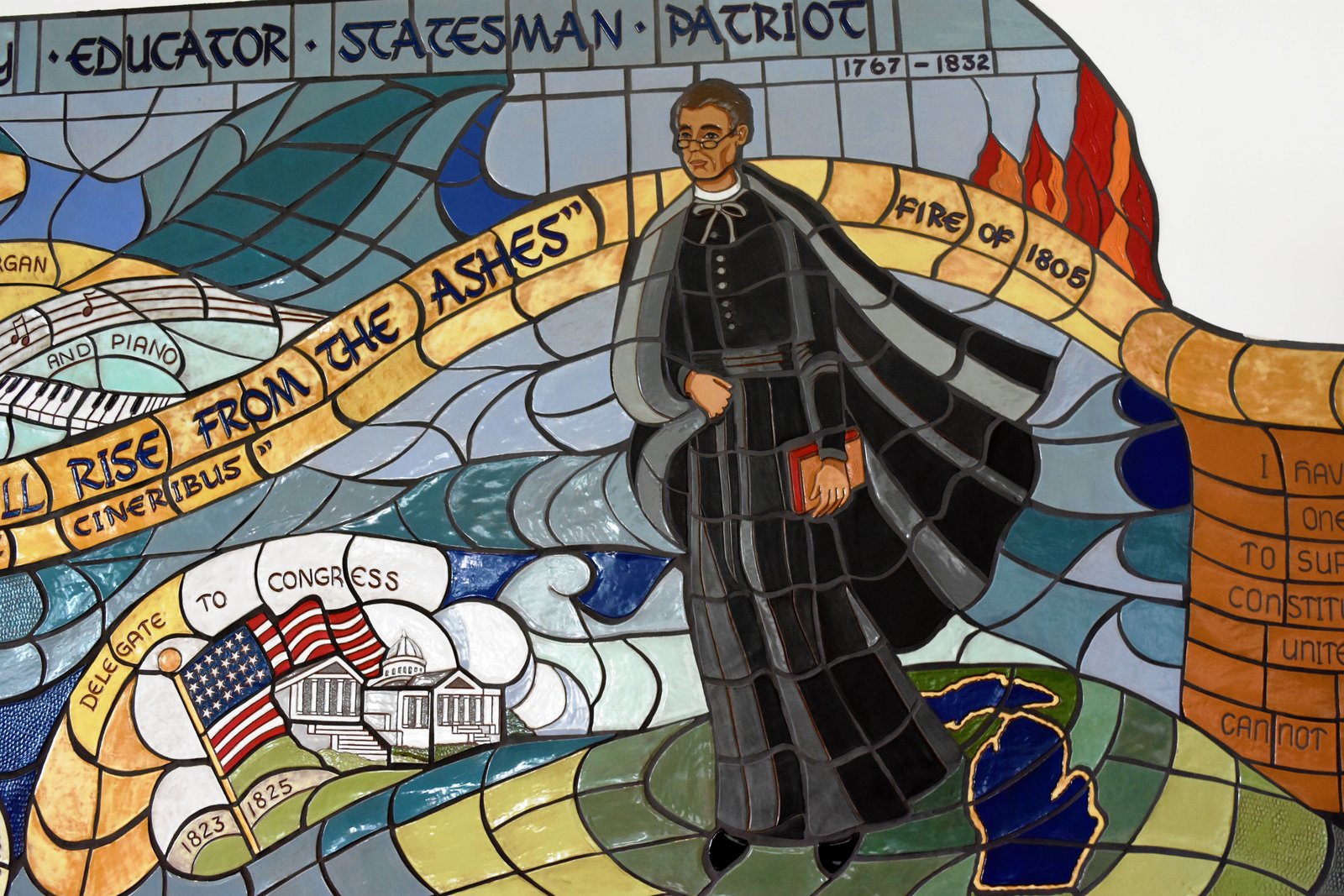 When Fr. Manilla and his team of organizers visited Huntington Place to look at the venue, they came upon a mural of Fr. Gabriel Richard. It was clear to them that this was the space where God wanted to welcome people for the Rising from the Ashes Revival, named after the phrase proclaimed by Fr. Richard after the Detroit fire of 1805 that would become the motto of the city of Detroit: “We hope for better things. It will rise again from the ashes. (Photo by Daniel Meloy | Detroit Catholic)