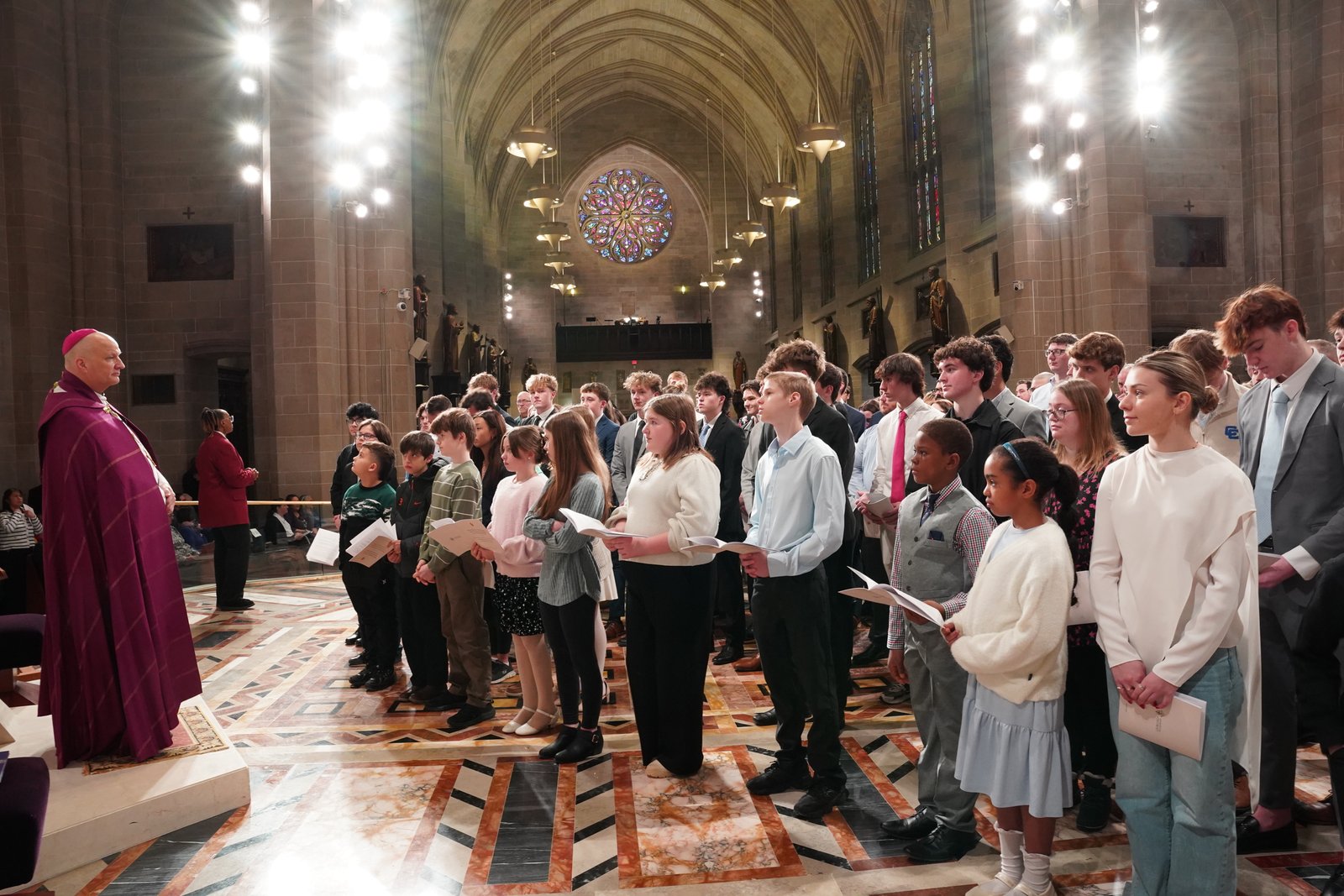 Archbishop Weisenburger told the candidates and catechumens at the Rite of Election that they are answering a call from God to follow Christ and His mission to love.