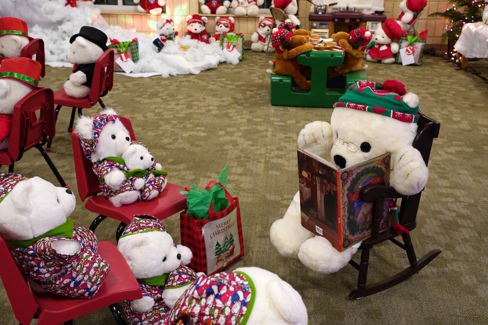 Fr. Terry Kerner said the Santa Bears started showing up in the 1980s when he was at St. John Parish in Monroe, and since then, people have kept giving him bears. He now puts them to use in handing out presents to children from the religious education program and to teach the children the meaning of Christmas.
