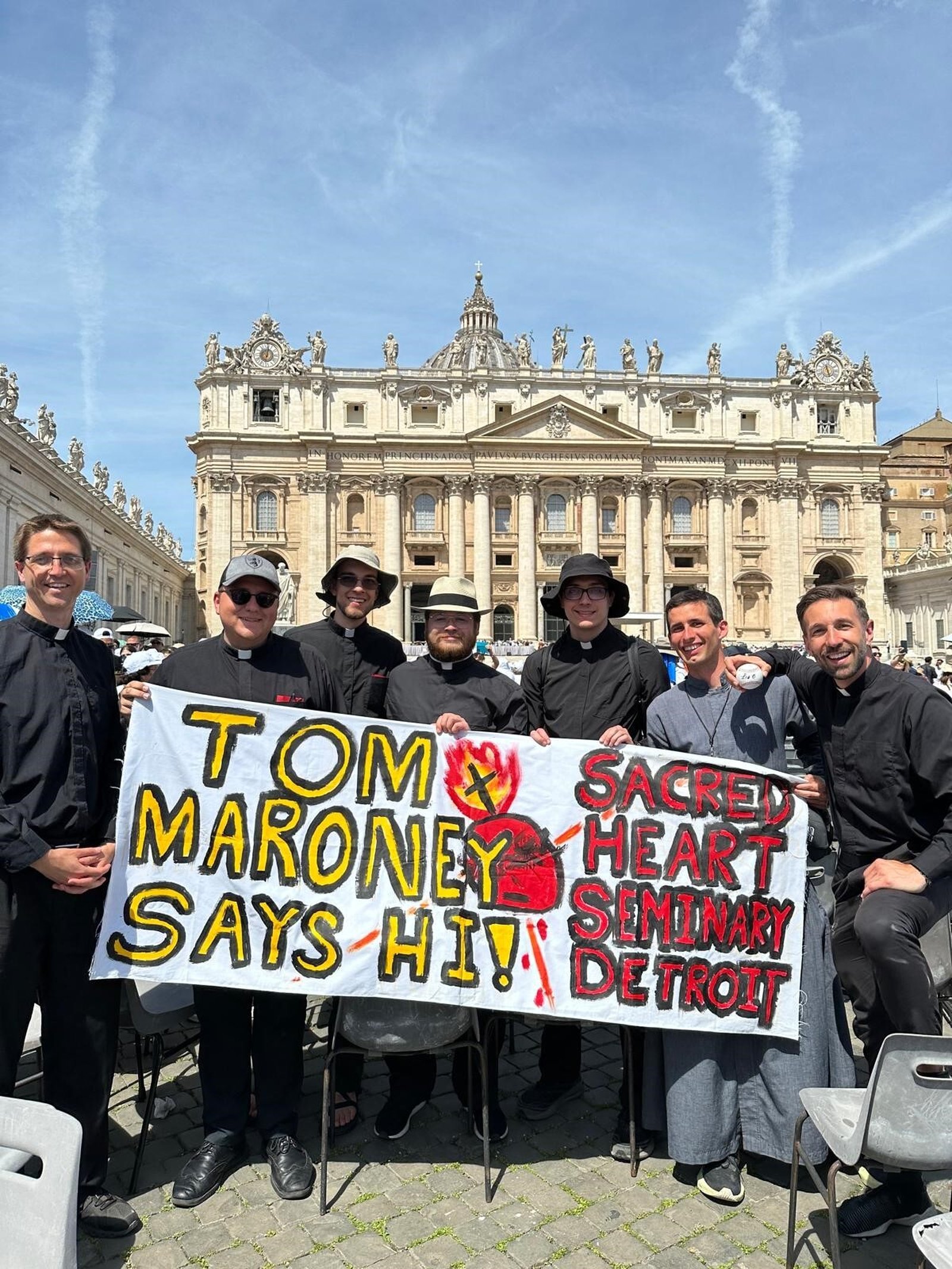 Seminarians from Sacred Heart Major Seminary hold up a sign for Pope Leo XIV during the pope's general audience June 4. The sign, which read, "Tom Maroney says hi!" was in reference to a high school classmate of the pope's and a friend of Kalamazoo seminarian Logan Scott's late uncle. (Photo courtesy of Logan Scott)