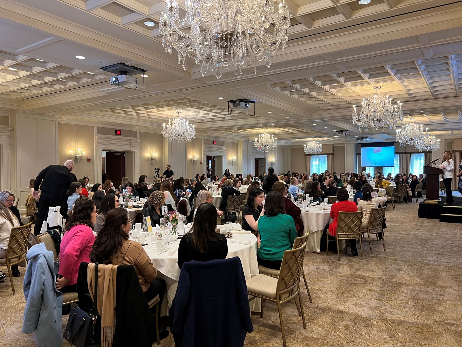 A sold-out audience listens to January Donovan, a life coach who runs The Woman School, during the "She Is ... Made for More" event at the Townsend Hotel in Birmingham.