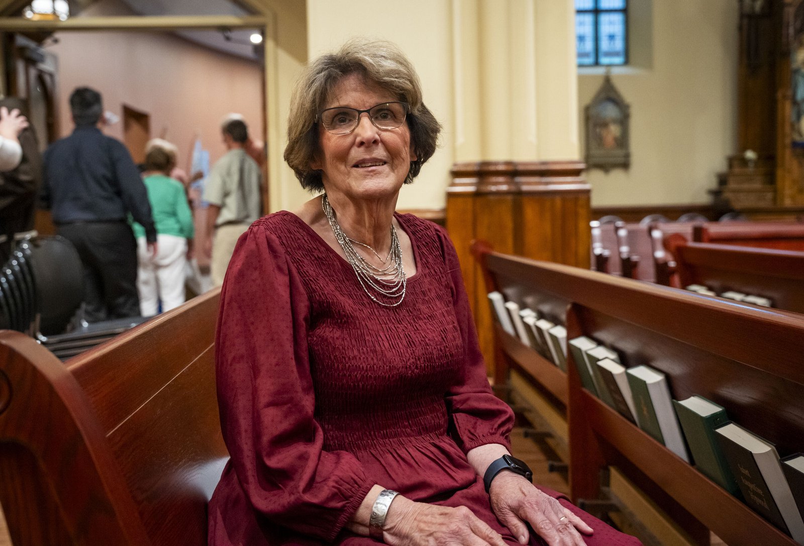 Nancy Long, the head of the Eucharistic Mission Band and a member of the group since 2011, presented a stole with the image of Blessed Solanus Casey as a gift to Archbishop Weisenburger.