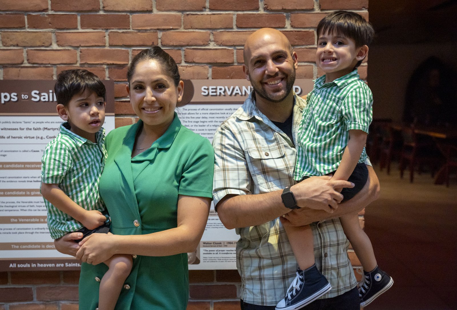 Sama Kizy and her husband, Tyson, attended the evening Mass along with her 2-year-old twin boys: Adam Solanus and Isaac Charbel.