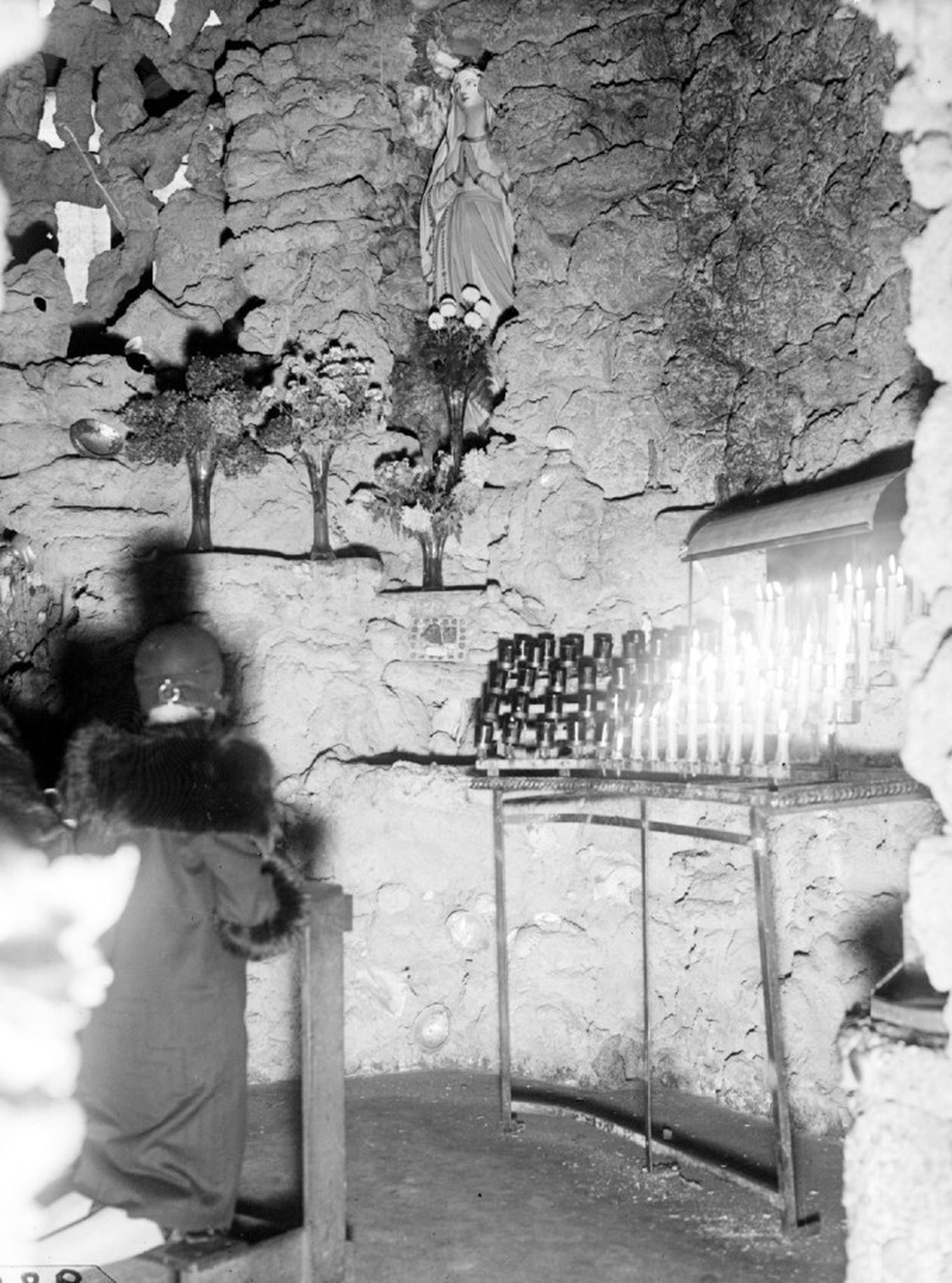 Fr. Joseph Wuest, C.S.Sp., led the parish when it installed the Grotto of Our Lady of Lourdes, the Garden of Gethsemane and the Grotto Baptistry, earning the parish the nickname "Church of the Grottos." (Photos courtesy St. Mary Parish)