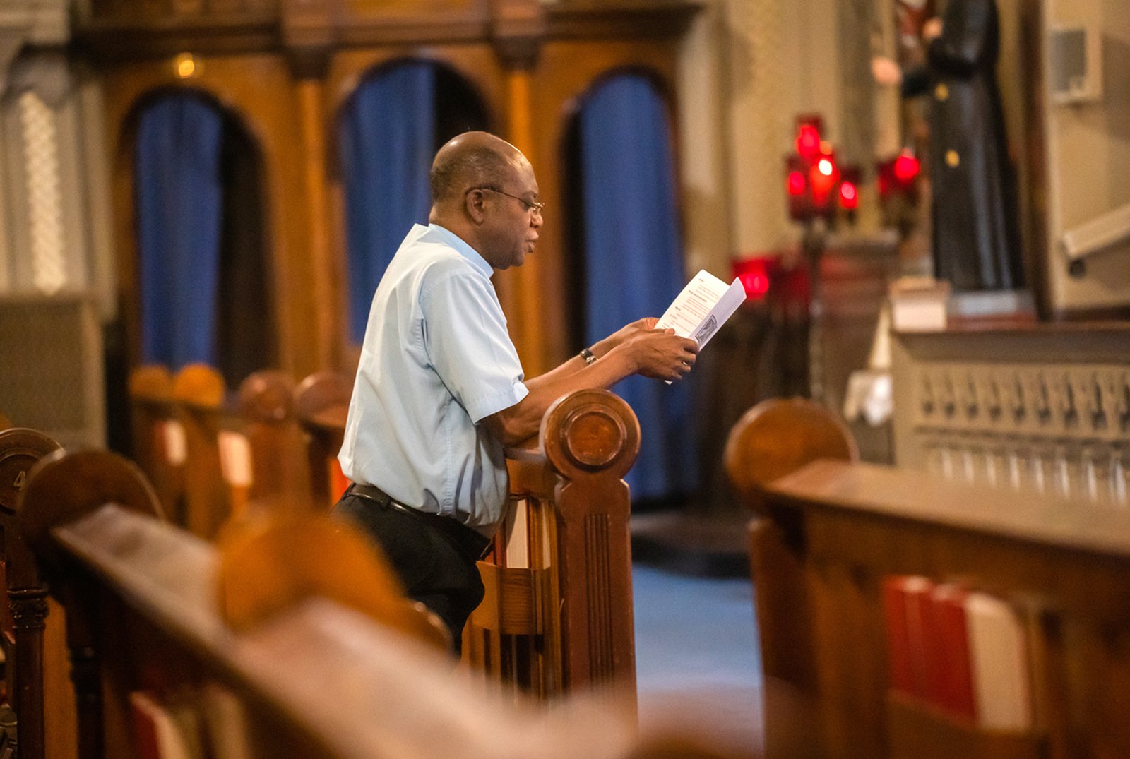 A man prays during a lunchtime holy hour at Old St. Mary's Parish in downtown Detroit in 2022. The Spiritans' decision to start a noon weekday Mass at the parish has allowed thousands of downtown Detroit workers to celebrate the sacraments during their lunch hours. (Valaurian Waller | Detroit Catholic)