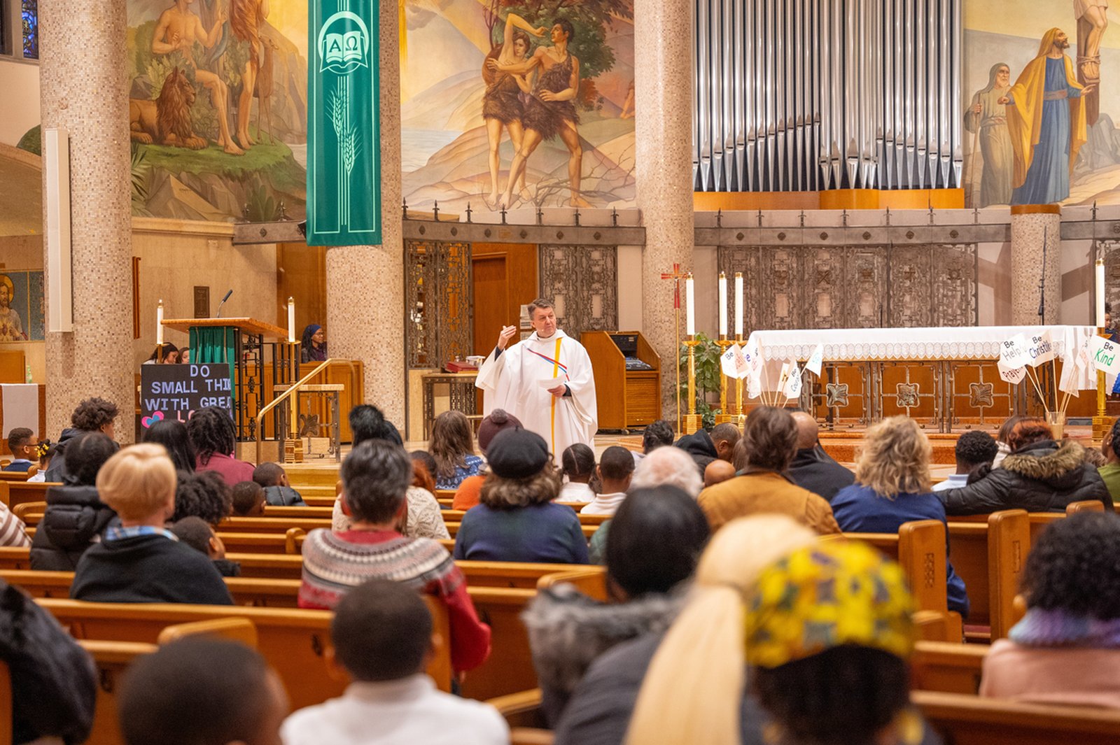Fr. Andrew Kowalczyk, CSMA, celebrates Mass at St. Clare of Montefalco Parish in Grosse Pointe Park on Jan. 31, 2024. Until 2012, the parish was staffed by members of the Order of St. Augustine, including Fr. Joe McCormick, OSA, who served the parish from 1995 to 2002. Fr. McCormick said Pope Leo XIV, then prior of the Midwest Augustinians, would drive from the province's Chicago headquarters to visit him at the parish. (Valaurian Waller | Detroit Catholic)