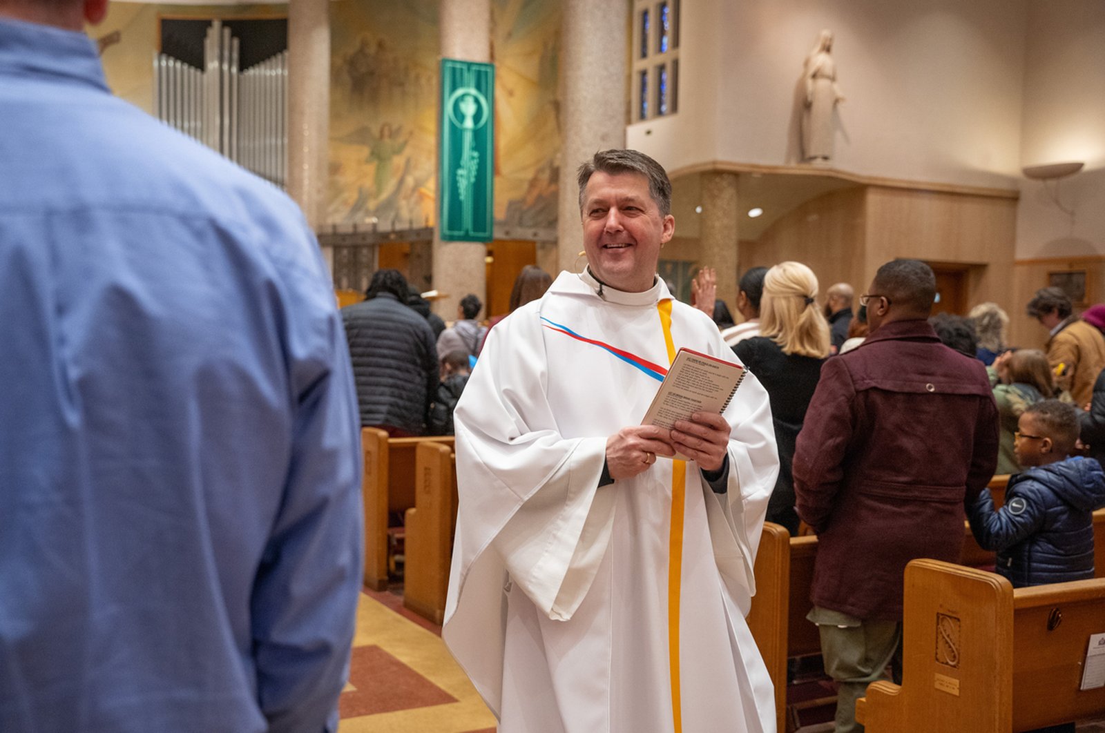 Fr. Andrew Kowalczyk, CSMA, celebrates Mass at St. Clare of Montefalco Parish in Grosse Pointe Park in January 2024. Since learning of Pope Leo XIV's connection to the parish, Fr. Kowalczyk said the entire community is proud and praying for the new Holy Father, who also visited the parish when he was prior provincial of the Midwest Augustinians. (Valaurian Waller | Detroit Catholic)