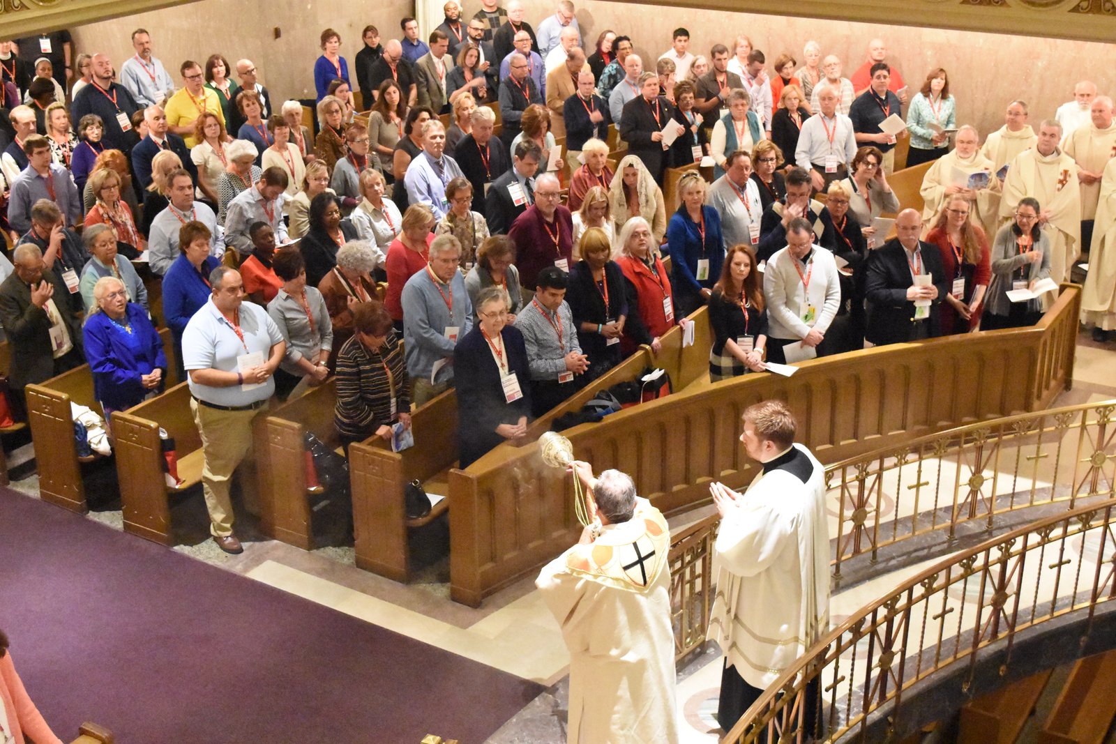 A deacon blesses members of Synod 16 with incense during the Synod's opening Mass on Nov. 18, 2016, at St. Aloysius Church in downtown Detroit. (Michael Stechschulte | Detroit Catholic)