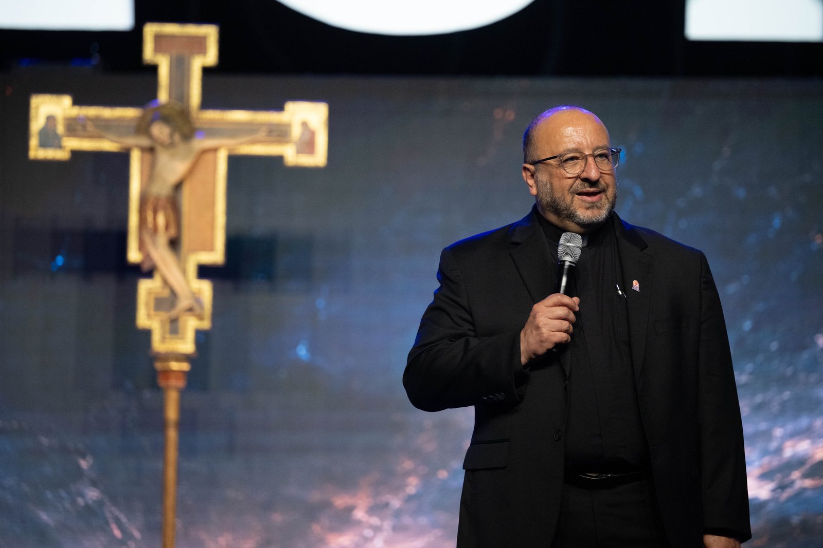 Fr. Joe Mallia, a priest of the Archdiocese of Detroit who serves at St. Kieran Parish in Shelby Township, originated the idea for the Rising from the Ashes Revival after seeing a widespread longing for connection, healing, and renewed purpose following the COVID-19 pandemic. (Tim Fuller | Detroit Catholic)
