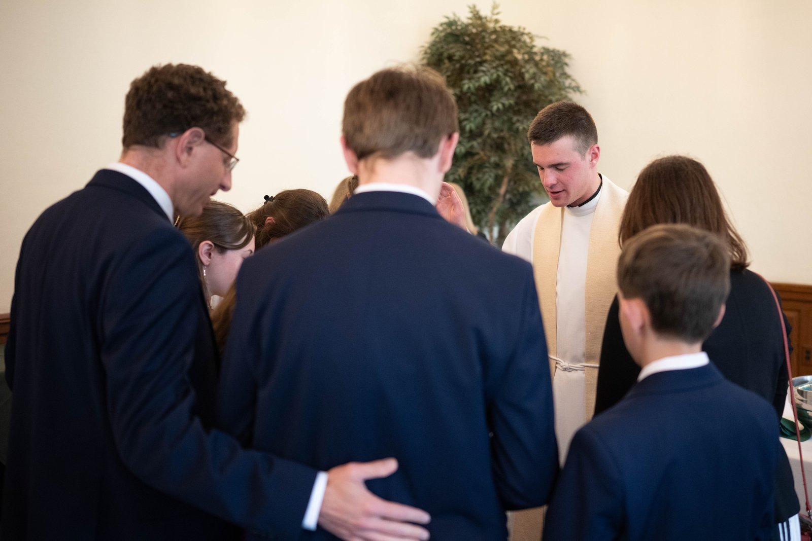 Fr. Karl Finkbeiner blesses friends, family and well-wishers at Sacred Heart Major Seminary following the ordination Mass.