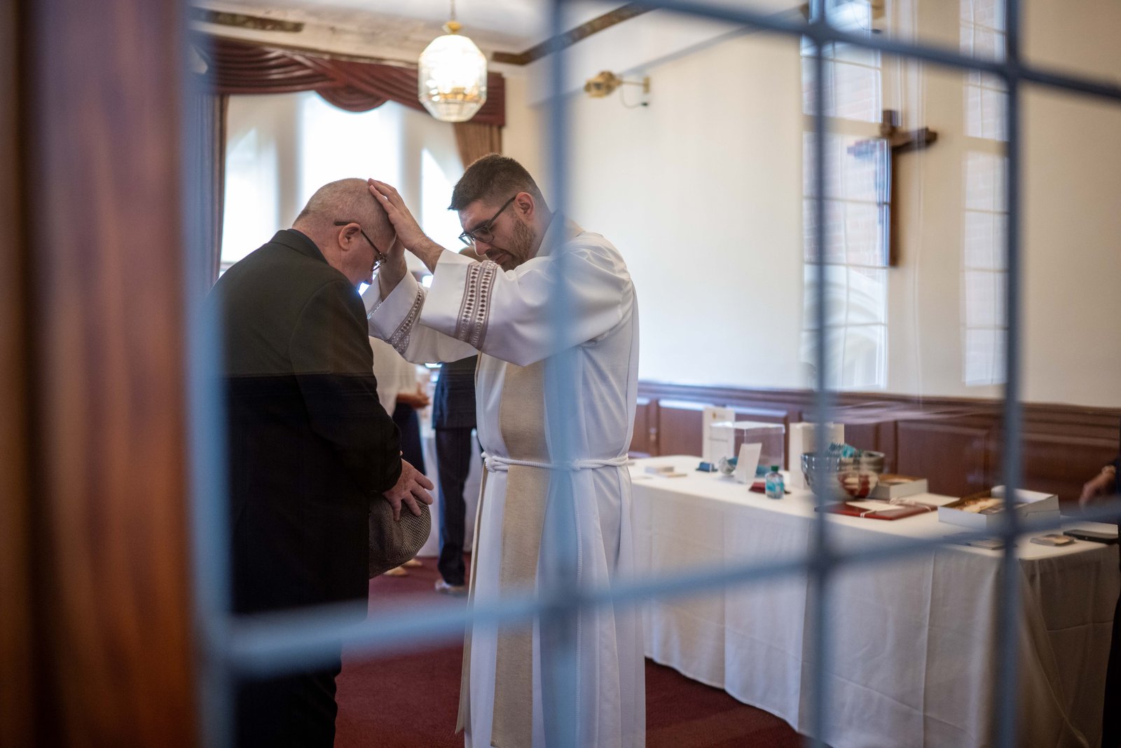 Fr. Lizandro Barba blesses friends, family and well-wishers at Sacred Heart Major Seminary following the ordination Mass.