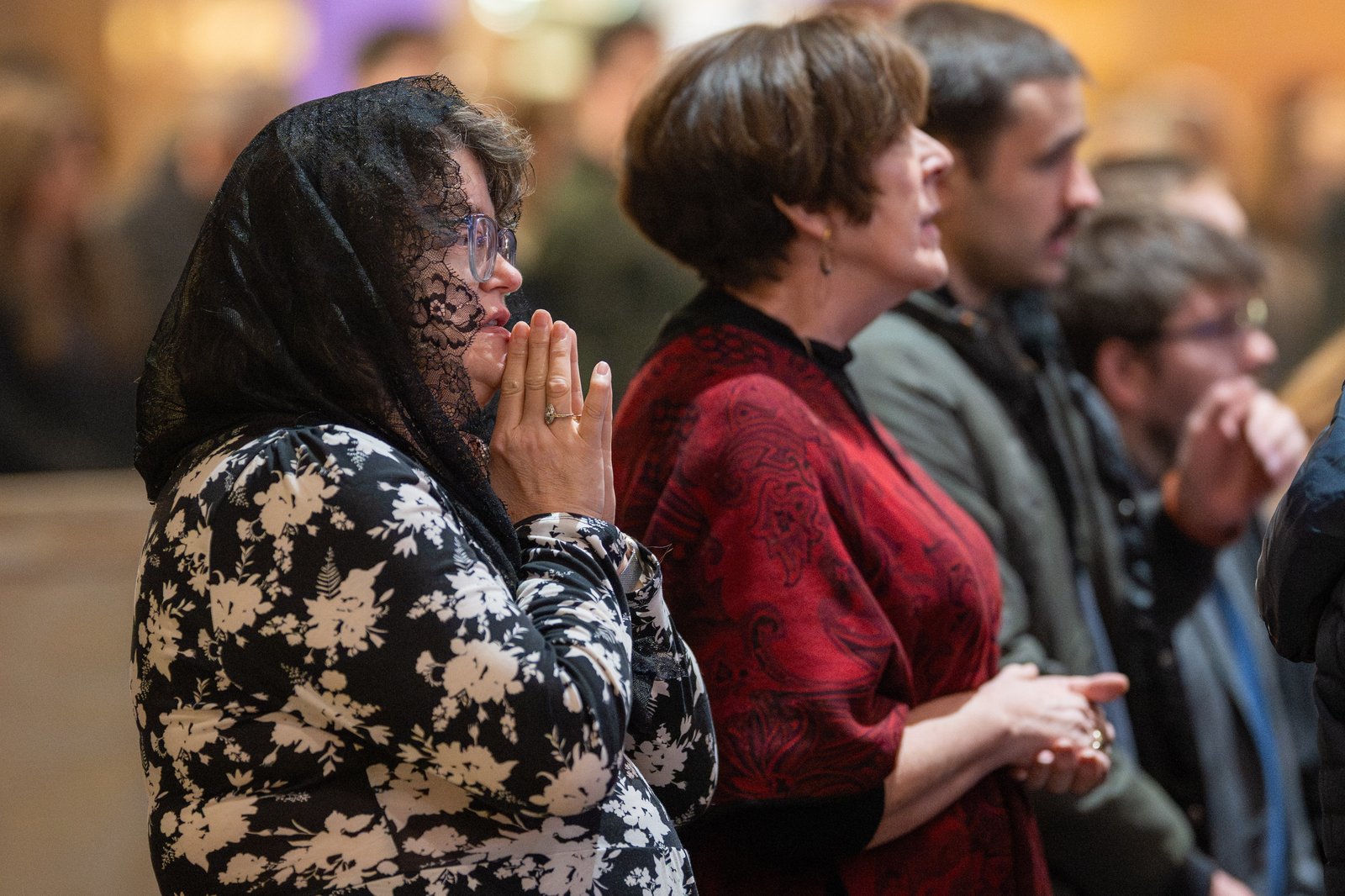 Massgoers listen to Cardinal Pizzaballa's homily Dec. 7 at the National Shrine of the Little Flower Basilica in Royal Oak.