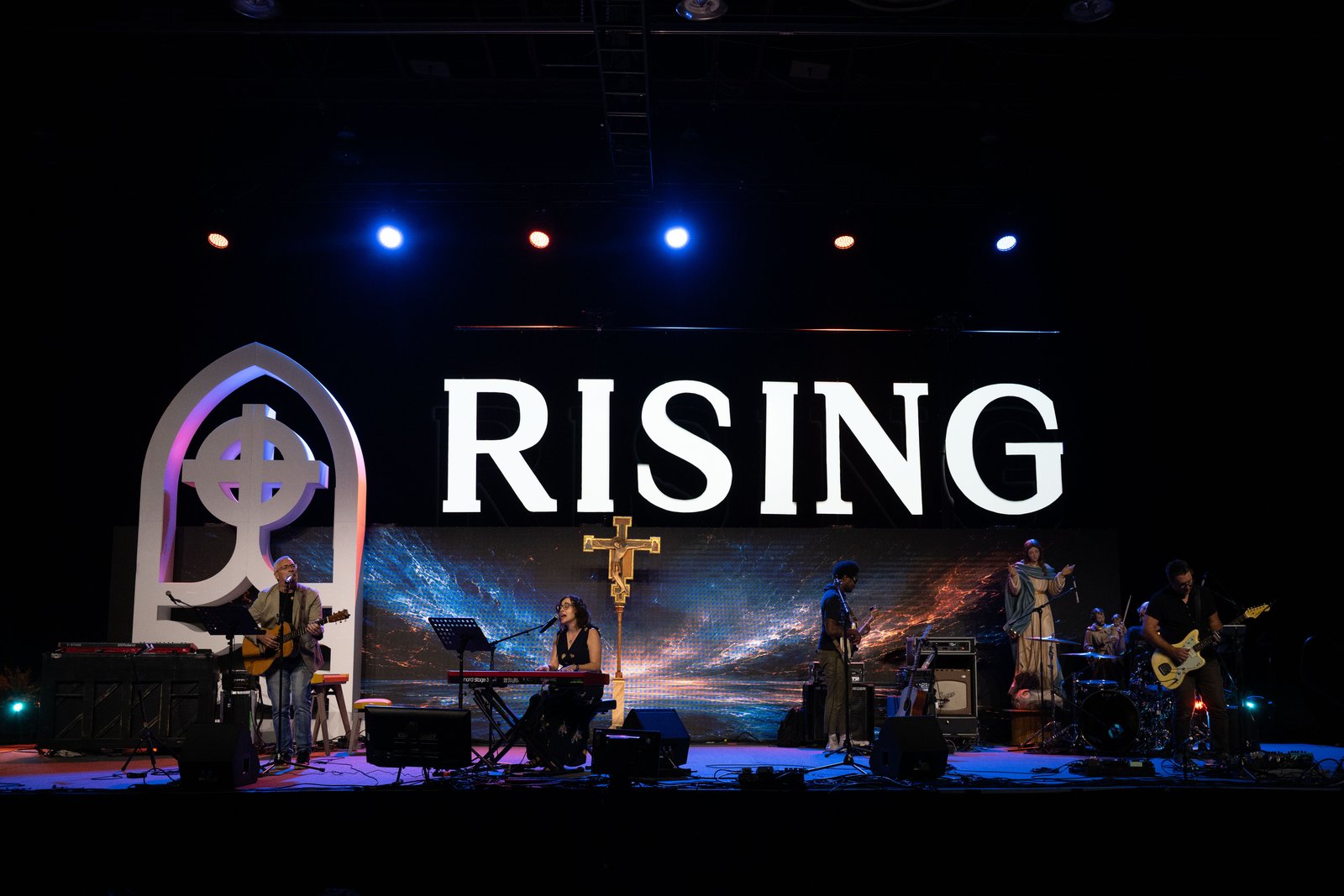 Musicians Matt Maher, Sarah Kroger, Steve Angrisano and Sarah Hart perform during a free concert at the conclusion of the Rising from the Ashes Revival in downtown Detroit. (Tim Fuller | Detroit Catholic)