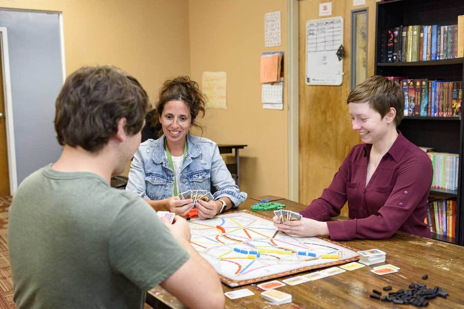 Case managers representing The Ark interact with a client. The Ark is an outreach program offered by Catholic Charities for the Diocese of Kalamazoo (CCDOK) for homeless or runaway youth. (Credit: CCDOK)