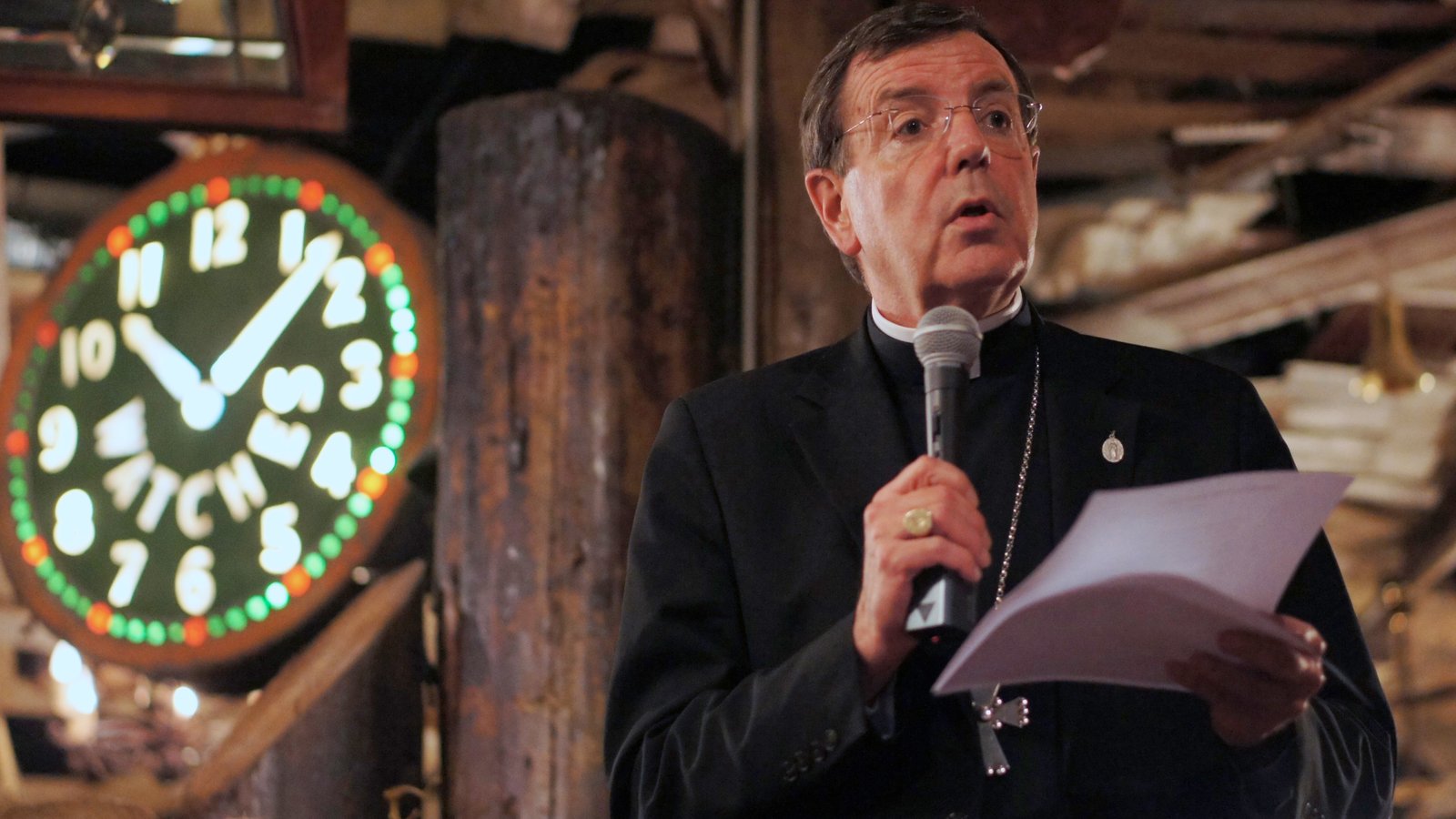 Archbishop Vigneron offers thoughts on practical ways to live the corporal and spiritual works of mercy during a Theology on Tap night April 8, 2015, at the Traffic Jam & Snug restaurant in Detroit. (Tim Hinkle | Detroit Catholic file photo)