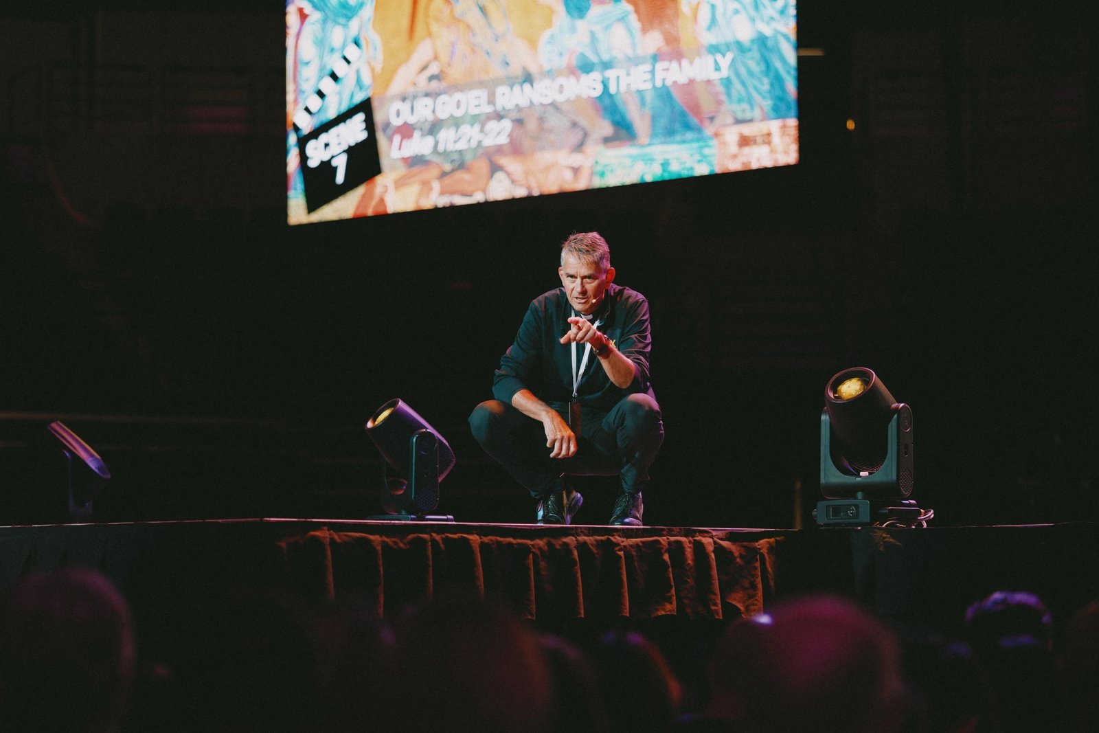 Fr. John Riccardo speaks on stage during a recent conference. Fr. Riccardo said his newest book, "The Resistence," is dedicated to his late parents, whose lives, he said, "revolved around Jesus, and everybody knew it."