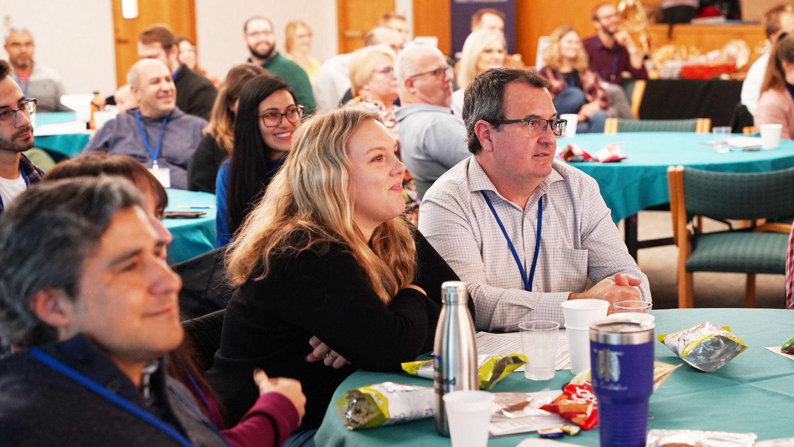 Couples listen to Charlotte Sacco speak about receiving the abundant grace available in the Eucharist and how that grace transforms a marriage during the Together in Holiness Conference at St. Hugo of the Hills Parish in Bloomfield Hills on Oct. 14.