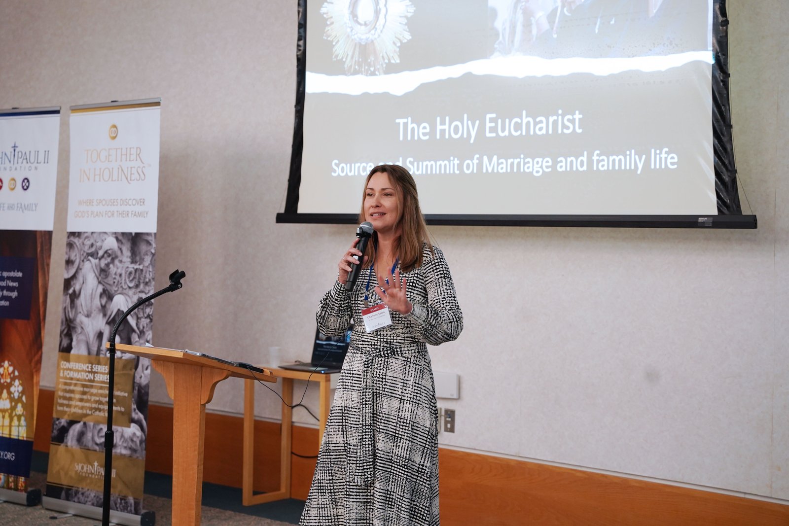 "How do we open our hearts to receive that love, so we are so filled with it that it spreads to our marriage, our family, our children, and into the world? That is our challenge,” Sacco said during her talk on the transforming power of the Eucharist.
