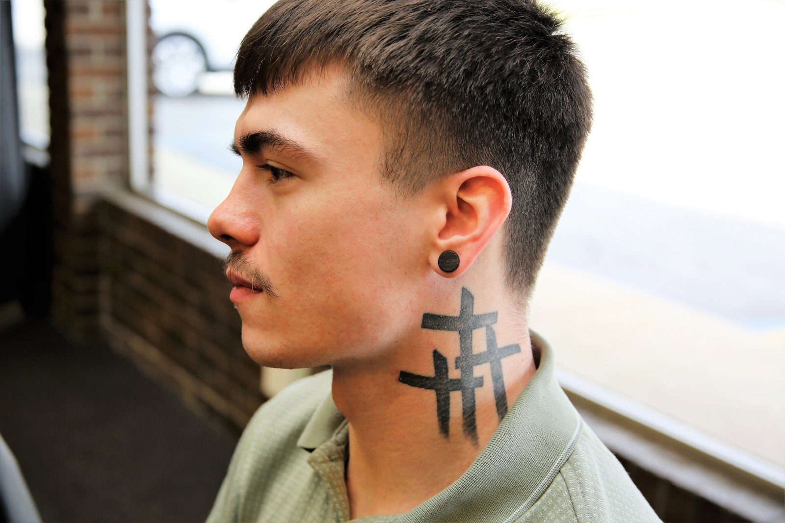 A tattoo on Trent's neck depicts three crosses representing the tragic deaths of three of Trent’s close friends. As he grows closer to Christ in his newfound Catholic faith, the tattoos covering Trent's body have taken on multiple meanings to him.