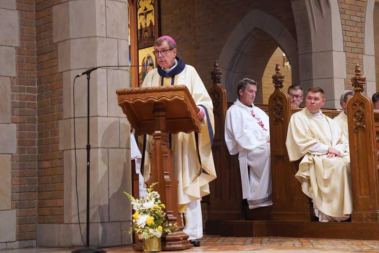 Archbishop-emeritus Allen H. Vigneron preaches during a Mass in which he joined friends, family and fellow clergy in giving thanks to God for 50 years in the priesthood.