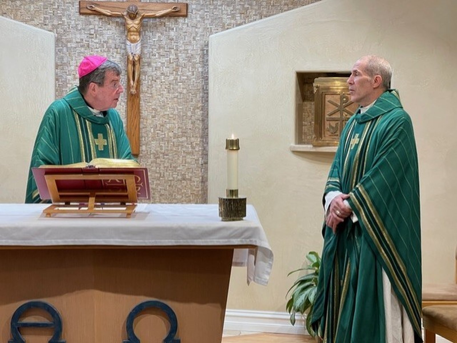 Retired Archbishop Allen H. Vigneron of Detroit celebrates Mass with Archbishop Byrnes in St. Joan of Arc's chapel. Archbishop Byrnes returned to Michigan in 2022 and his resignation was accepted by Pope Francis in 2023. (Photo courtesy of St. Joan of Arc Parish)
