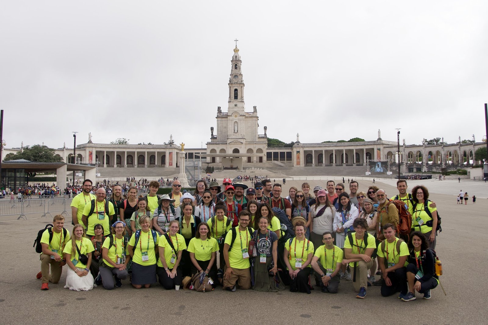 Detroit pilgrims pose for a photo before the Sanctuary of Fatima. Seeing the spot where Mary appeared to Sts. Francisco and Jacinta Marto and Venerable Lucia dos Santos was a powerful experience, pilgrims said.