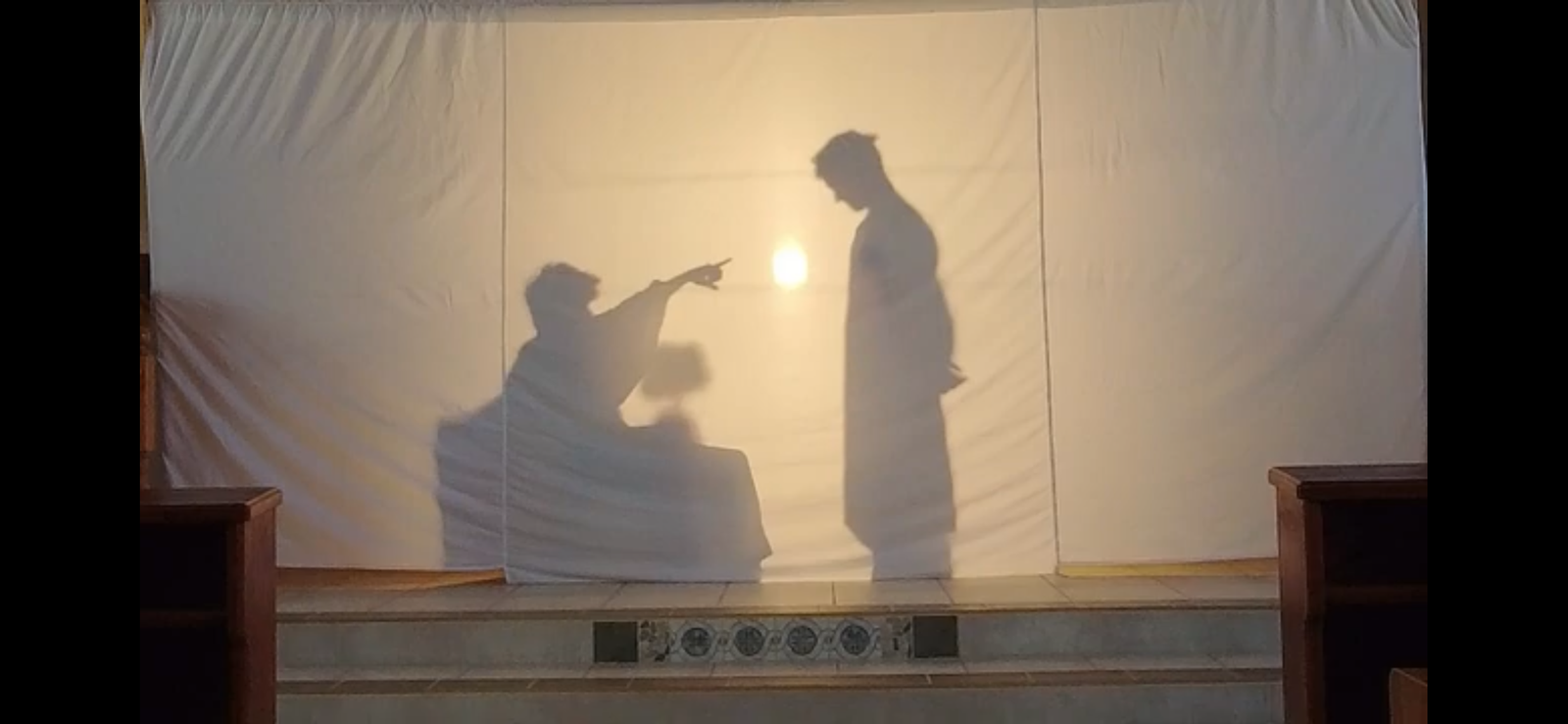 Teens in seventh and eighth grade present "Shadow Stations of the Cross" on Good Friday last year at SS. Peter and Paul Parish in North Branch. This year, youths in grades 9-12 will present the shadow stations during Holy Week.