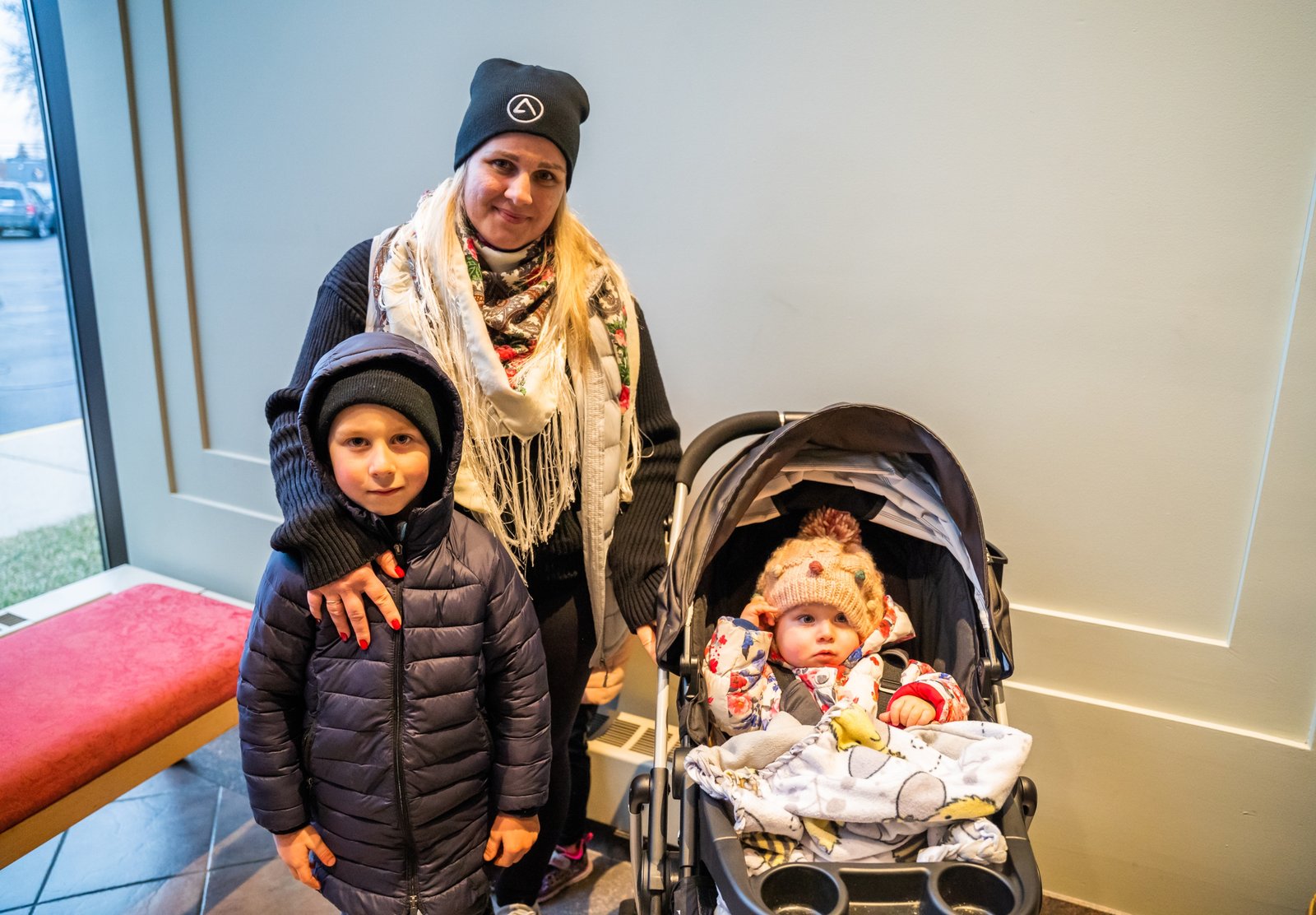 Romana Petryshyn attended the rally with her three young children. Petryshyn was born and raised in the western Ukrainian city of Ivano-Frankivsk. She told Detroit Catholic the local airport has been bombed, and that her grandparents and her husband’s entire extended family are still there, scared and with packed bags. (Valaurian Waller | Detroit Catholic)