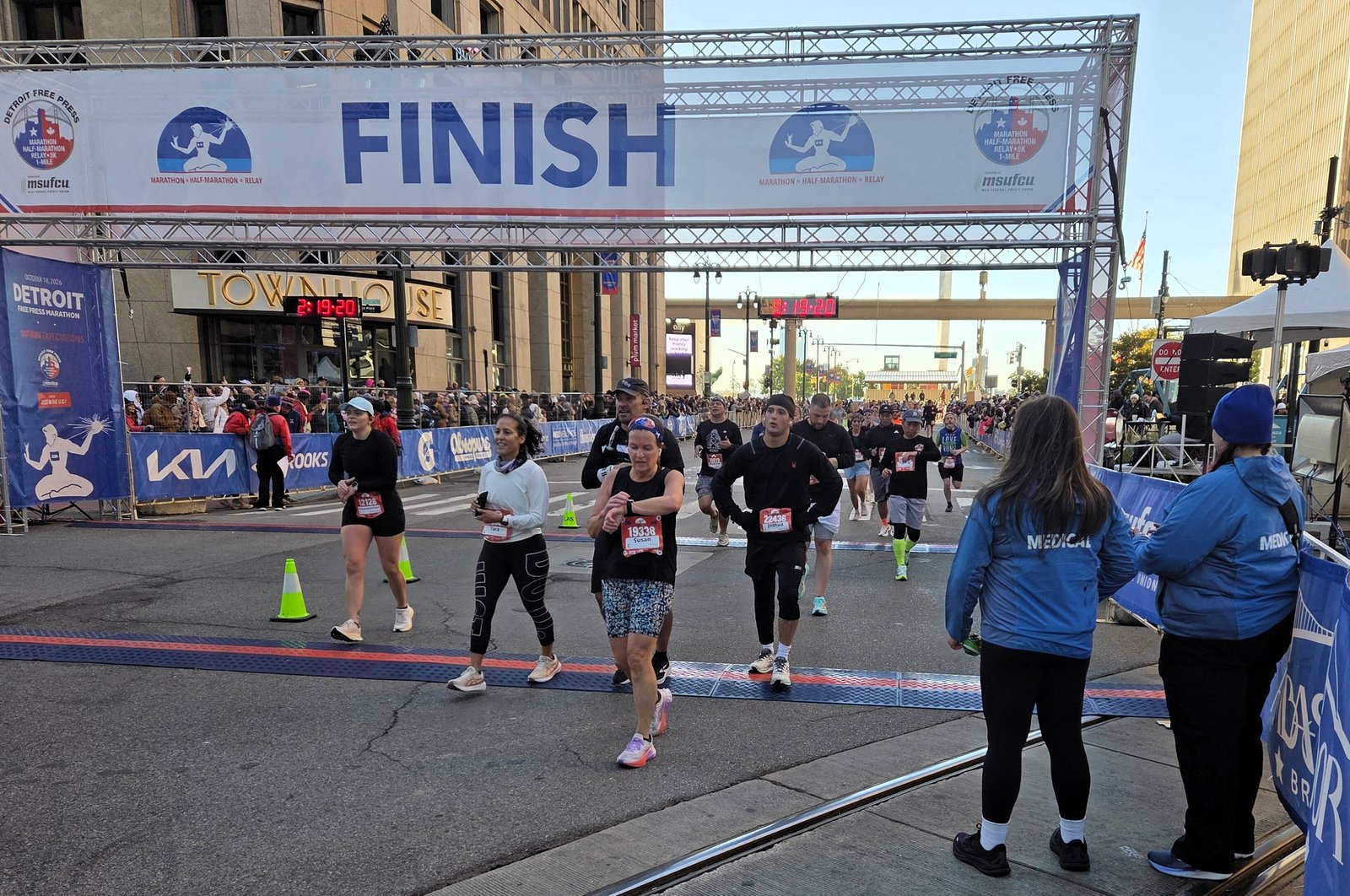 A few of the runners in the Detroit Free Press Half-Marathon cross the finish line on Woodward Avenue on Oct. 18. The 49th annual event drew a record 30,000 participants across eight races.