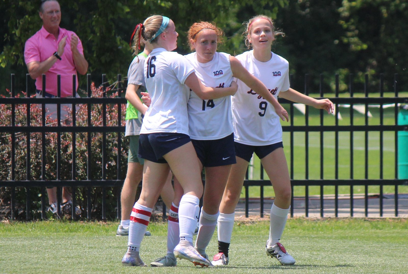 ddison Hamilton and Charley McCracken mob Kerith Short after she scored University-Liggett’s lone goal with a second-half corner kick.