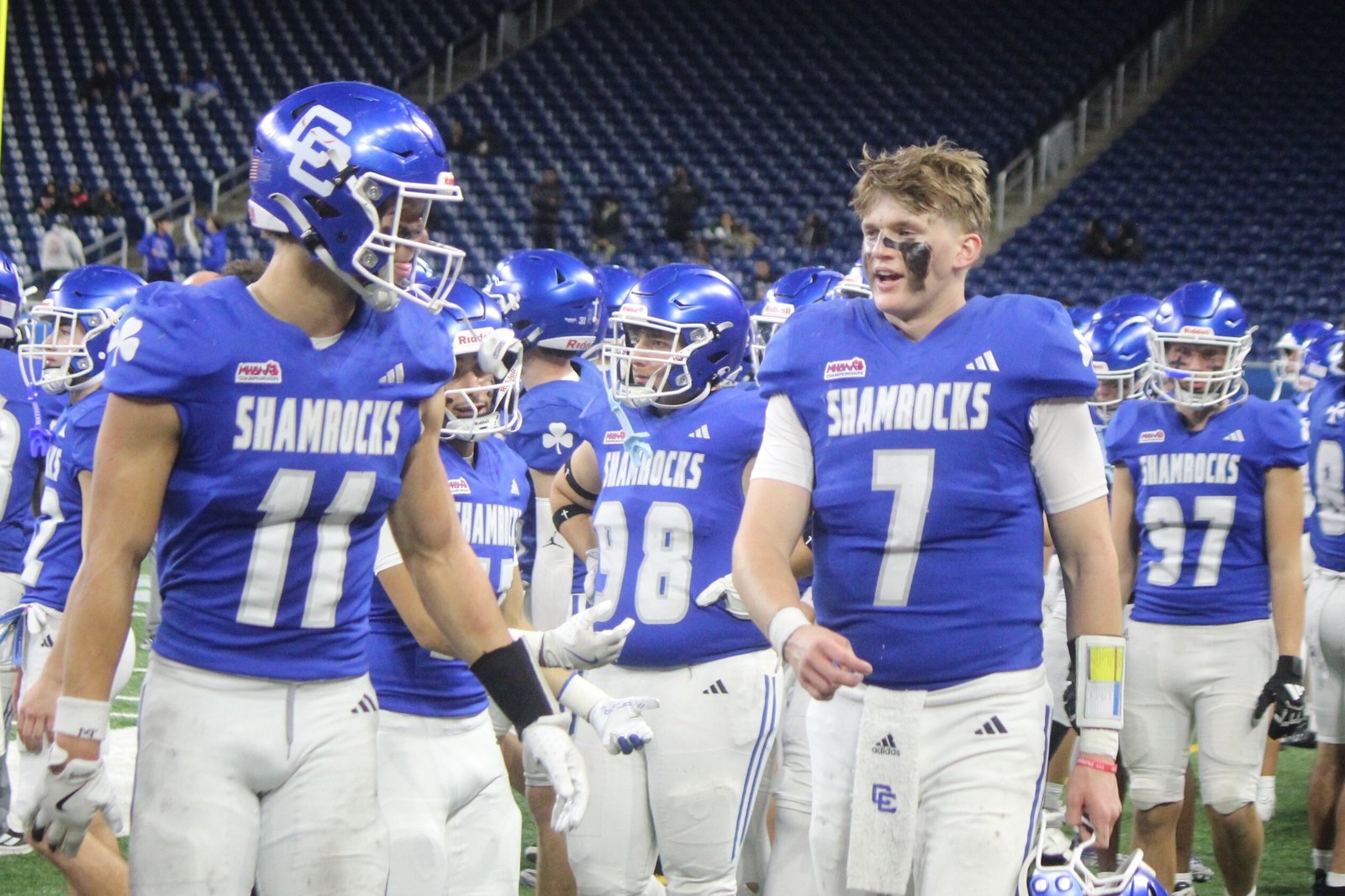 Wide receiver Gideon Gash (11) and quarterback Duke Banta (7) connected for three touchdown passes in Catholic Central’s state championship victory over Detroit Cass Tech last November, return to the Shamrocks’ lineup this fall.