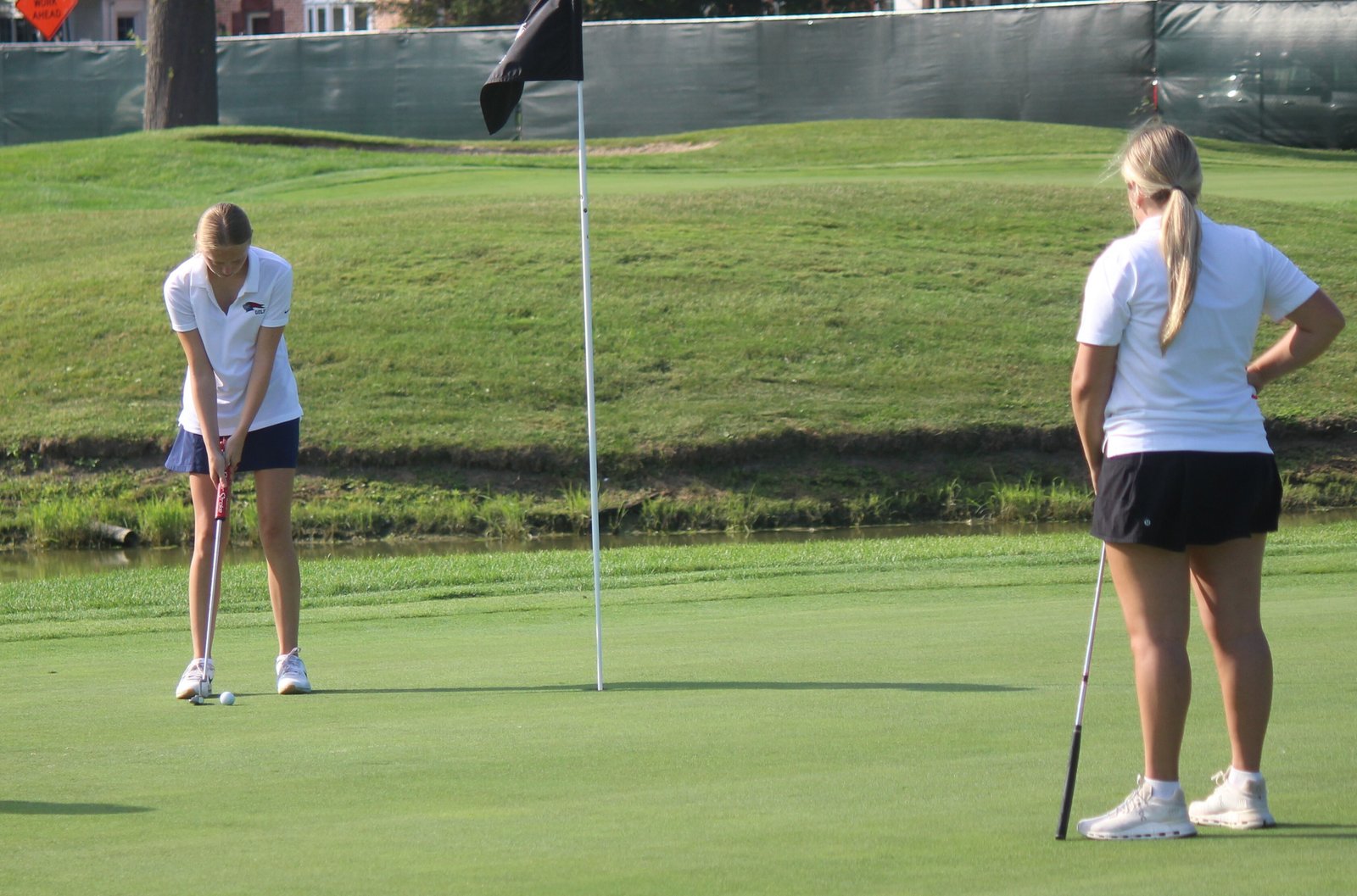 Olivia Boggs concentrates before sinking a four-foot putt on the eighth green. Boggs is one of four freshmen in Liggett’s lineup.
