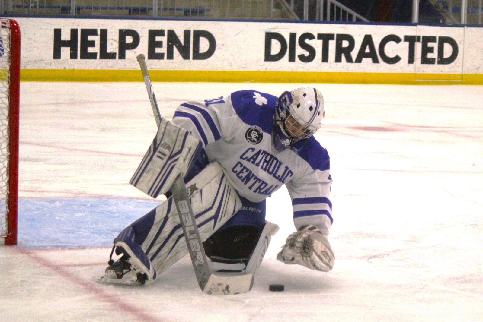 Shamrocks goaltender Joe Bedells is ready to smother a loose puck for a save. Bedells shut out Cranbrook over the last 25 minutes of the game, preserving Catholic Central’s 3-2 win.