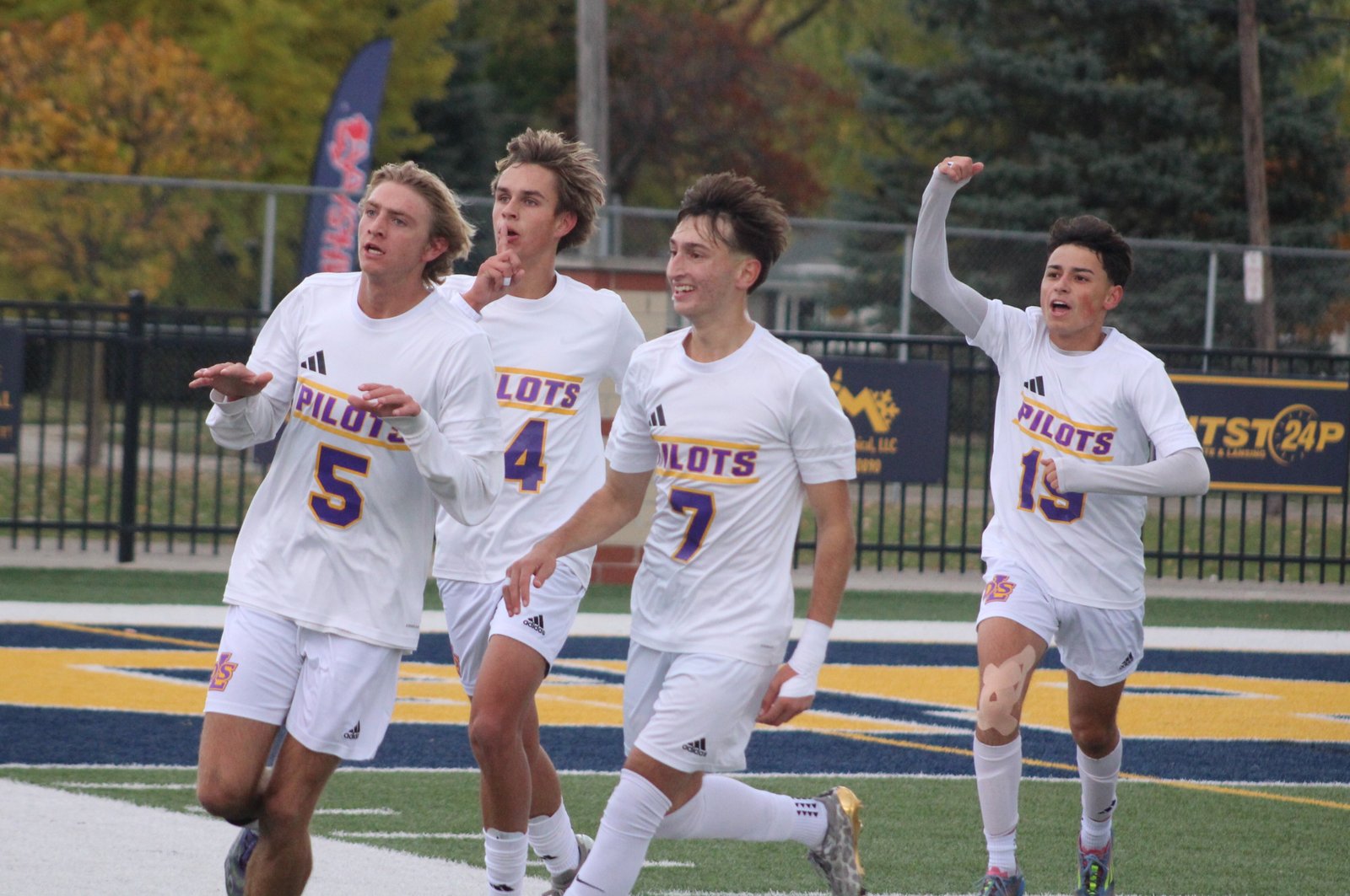 James Spicuzzi, Andrew Corder, Settimo Leone and Vince Houlihan quiet Hudsonville Unity Christian’s student cheering section after Spicuzzi’s first-half goal gave Warren De La Salle a 1-0 lead in the MHSAA Division 2 state soccer final.