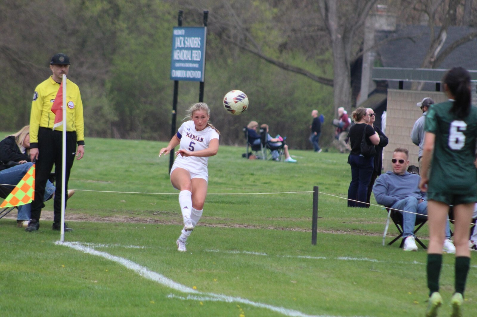 Junior captain Nia Bordogna pops a cross pass from the right corner late in the game as defending league champion Marian defeated Catholic League nemesis Cranbrook.
