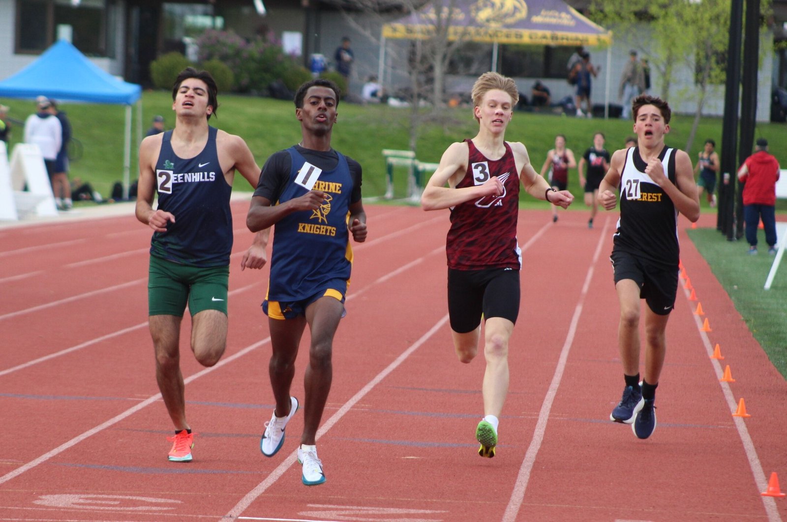 Royal Oak Shrine’s Abenezer Cerone (1), shown winning the Catholic League Ste. Anne Division title in the 1600 last month, set state records in winning both the 1600- and 800-meter runs at the MHSAA Division 4 finals at Hudsonville. His two state-meet victories helped the Knights finish third.