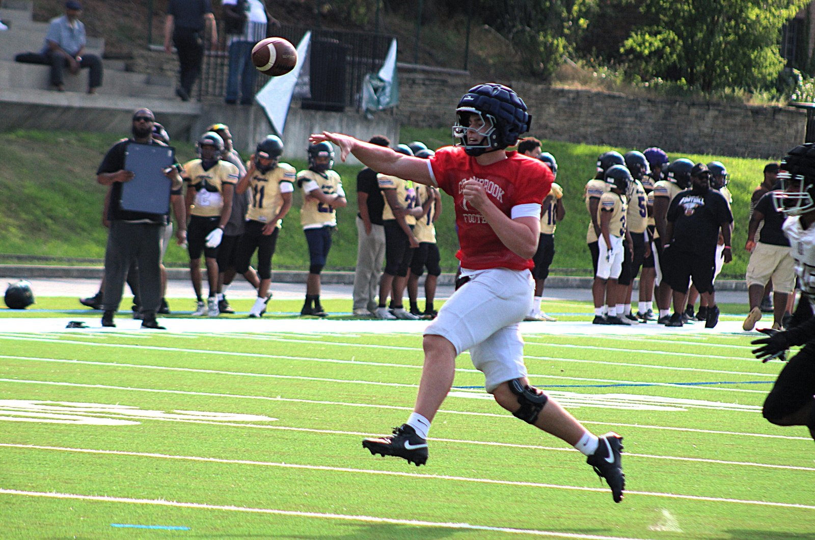 Bloomfield Hills Cranbrook quarterback Raine Thomas launches a pass up field during the Cranes’ Aug. 20 scrimmage against Detroit Lincoln-King high school. Cranbrook is predicted to win the CHSL’s Intersectional-1 Division.