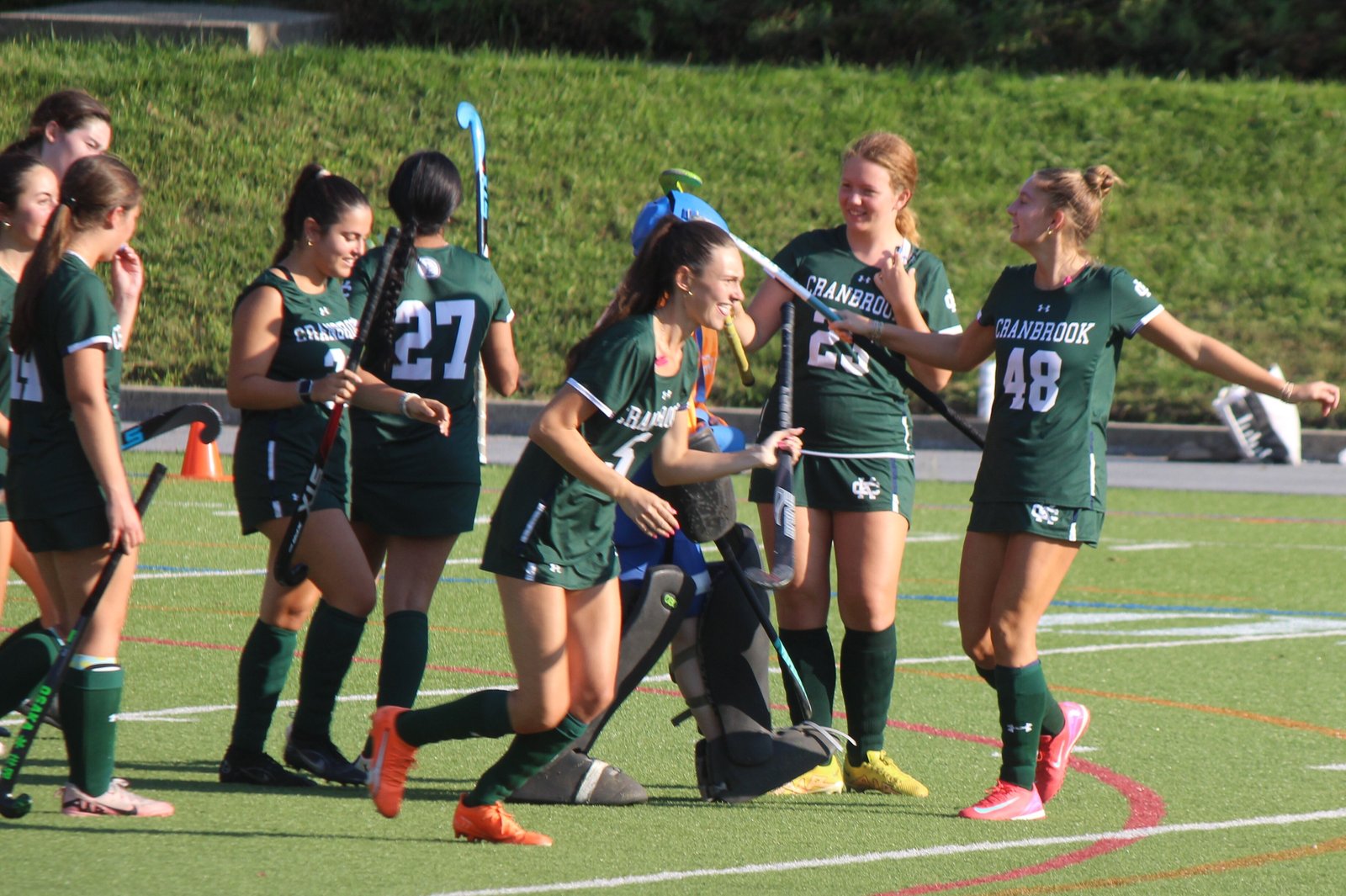 Bloomfield Hills Cranbrook Kingswood players celebrate following their 2-1 victory over visiting Ann Arbor Fr. Gabriel Richard on Sept. 2. The two schools have developed a good field hockey rivalry, having previously faced each other in the quarterfinals of the coaches’ association’s state tournament in 2024.