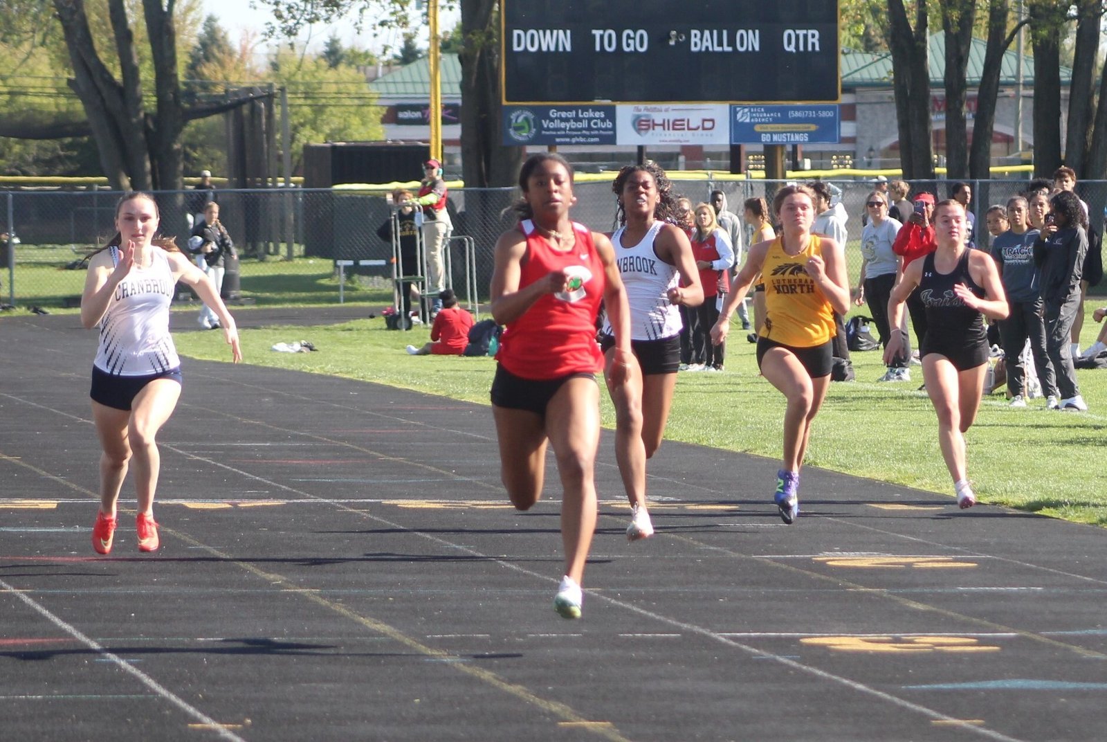 Toledo Central Catholic’s Nyla King approaches the finish line at the front of the 100-meter dash during the Catholic League’s Cardinal Division championship meet held May 9 at Lutheran North. King went on to win three events at the OHSAA track finals, June 6 in Columbus.